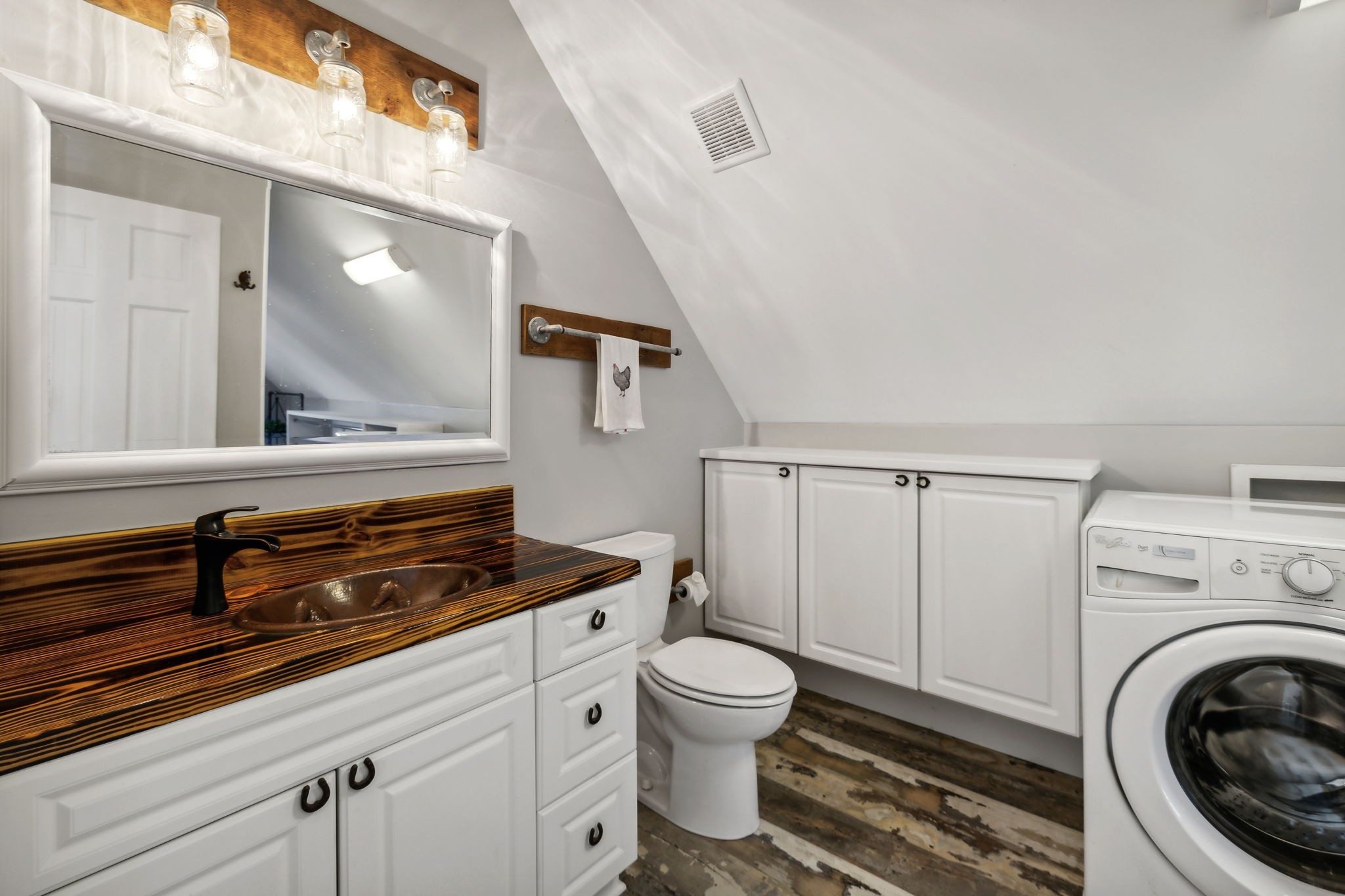 4325 Cave Springs Road Santa Fe, TN 38482 - Photo 69 of 98 a bathroom with a sink a toilet and a mirror