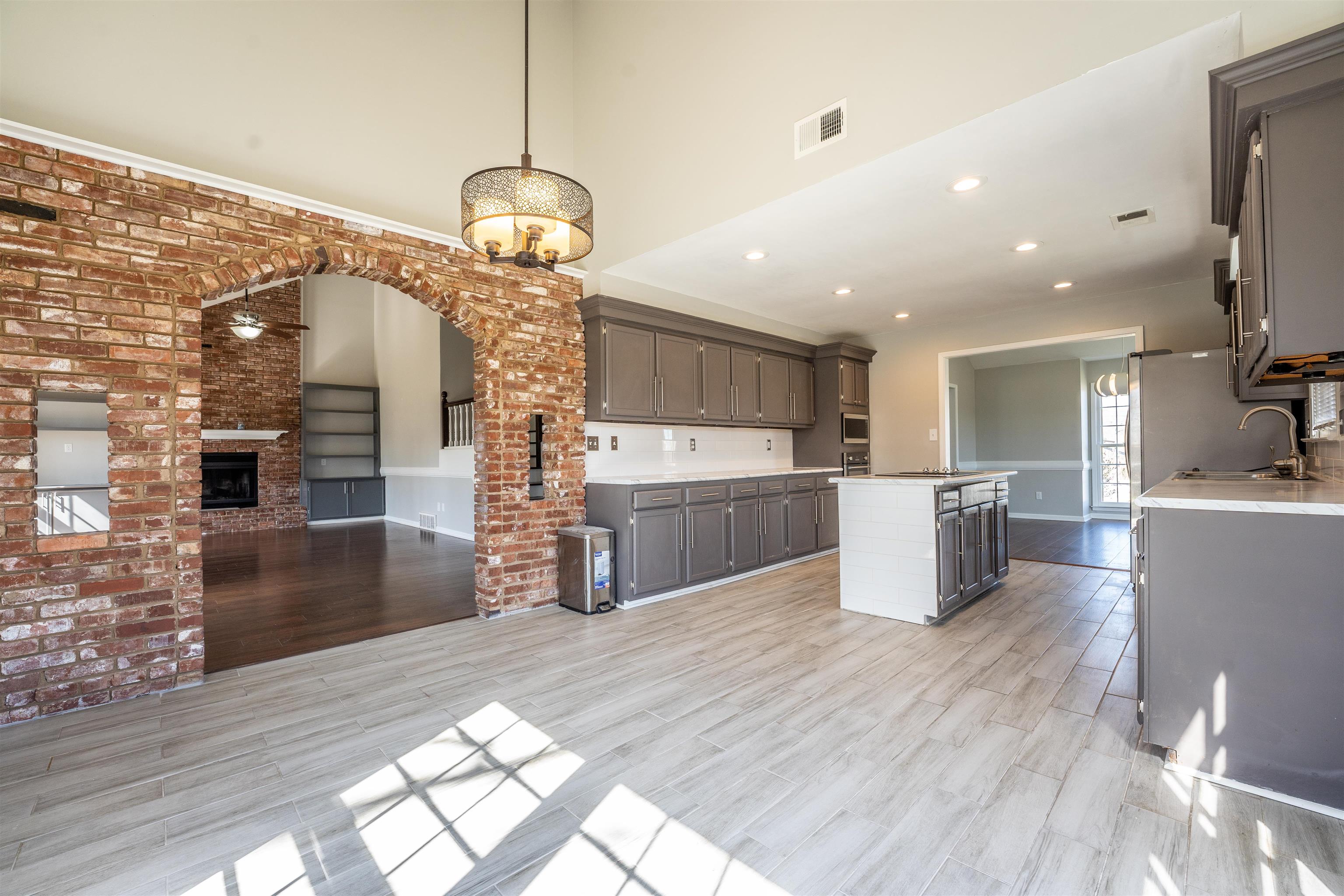 8747 Walnut Grove Road Memphis, TN 38018 - Photo 8 of 25 a view of a kitchen and dining room