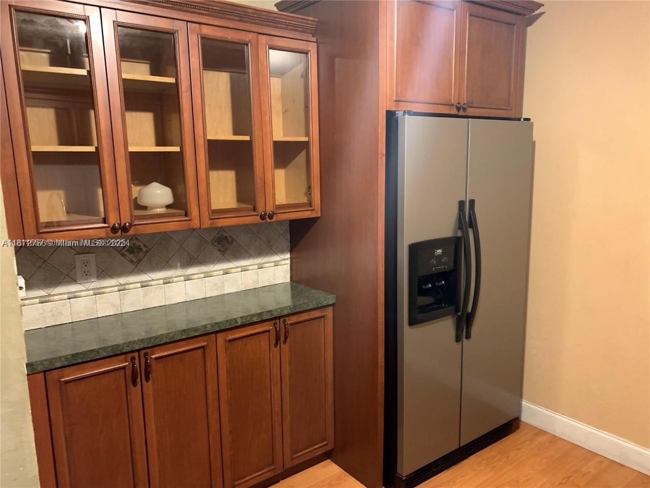 2701 Utopia Drive, Unit A Miramar, FL 33023 - Photo 3 of 6 a view of a storage and utility room with washer and dryer
