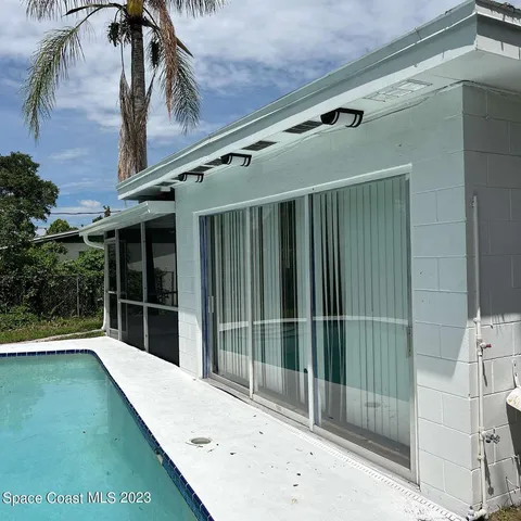a view of backyard with cabin