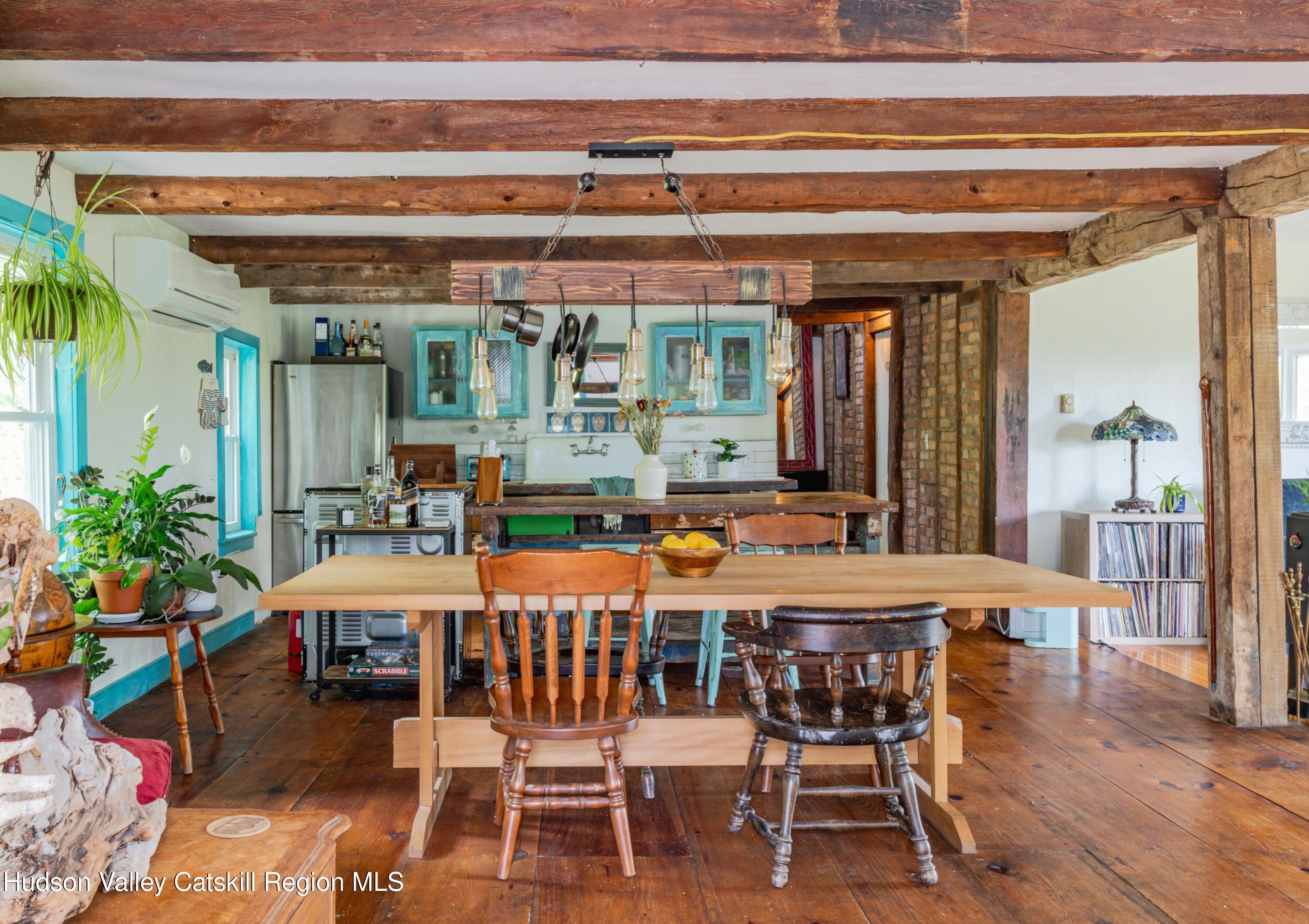 99 Spoorenburgh Road Athens, NY 12015 - Photo 13 of 39 a view of a dining room with furniture window and outside view