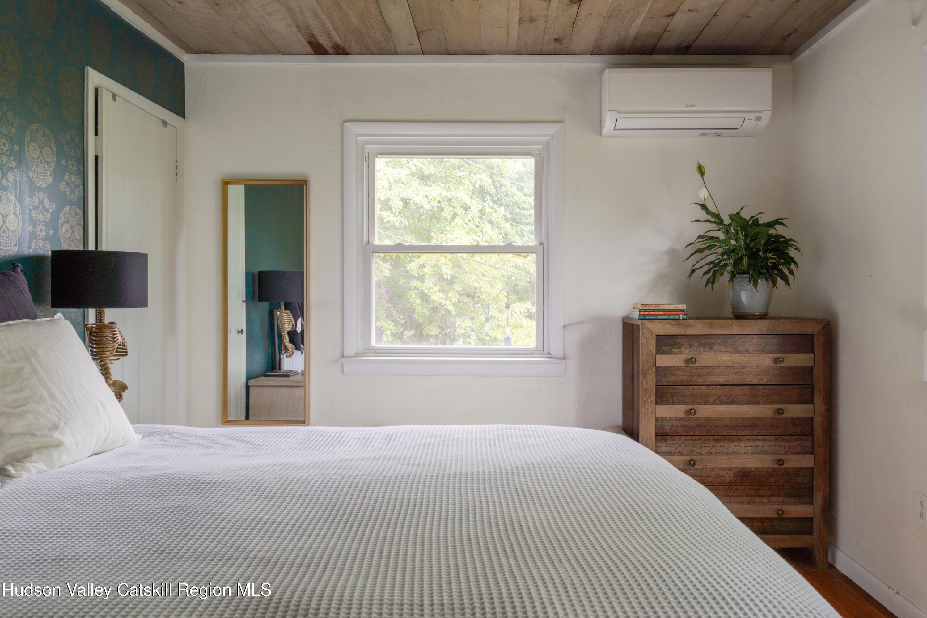 99 Spoorenburgh Road Athens, NY 12015 - Photo 21 of 39 a bedroom with a bed and a window