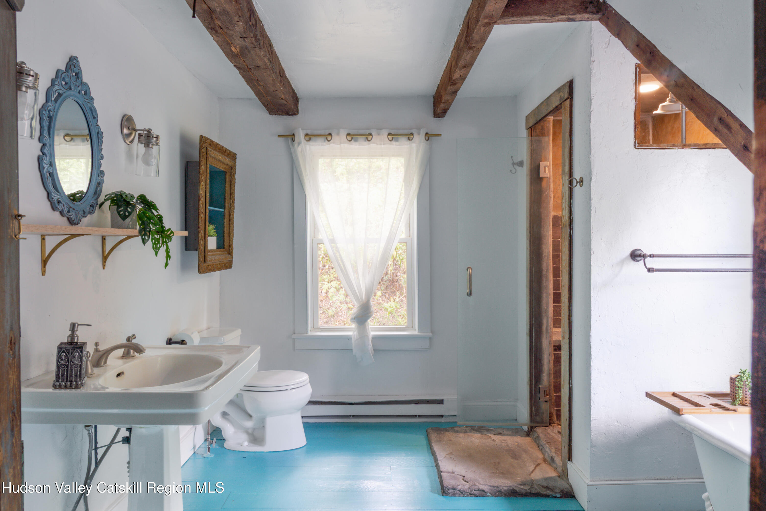 99 Spoorenburgh Road Athens, NY 12015 - Photo 27 of 39 a bathroom with a toilet sink and mirror