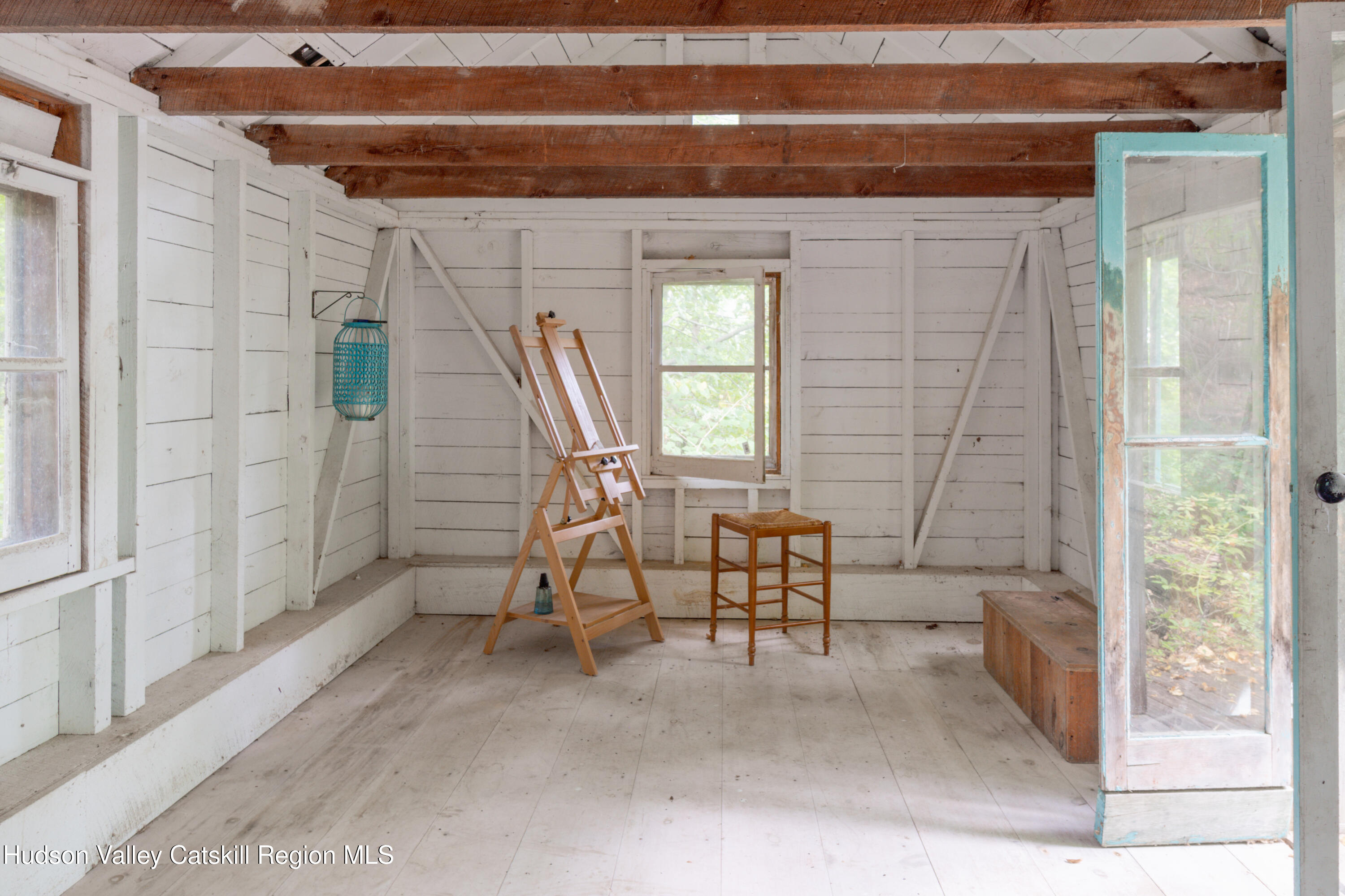 99 Spoorenburgh Road Athens, NY 12015 - Photo 29 of 39 a view of a room with table and chairs