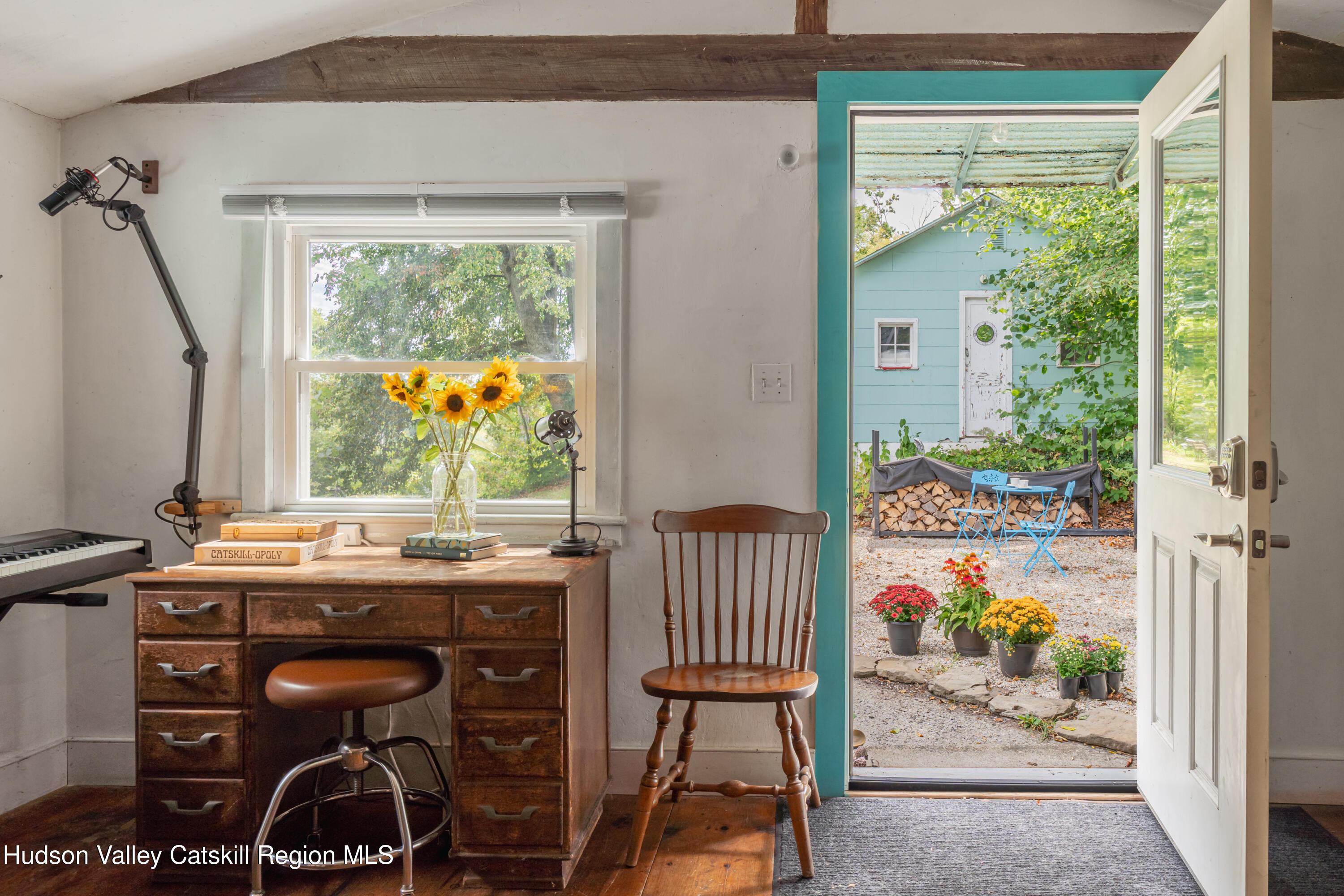 99 Spoorenburgh Road Athens, NY 12015 - Photo 3 of 39 a view of a room that has a table and chairs in it