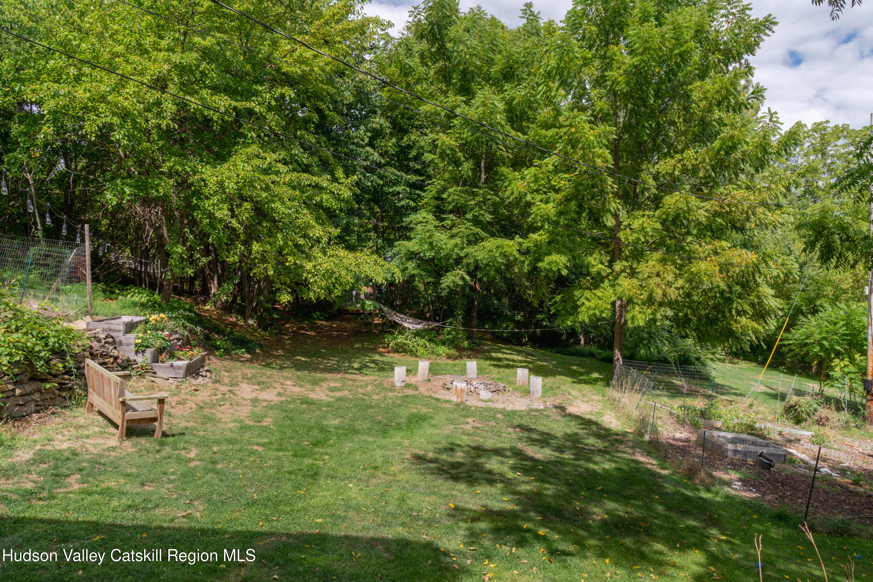 99 Spoorenburgh Road Athens, NY 12015 - Photo 33 of 39 a backyard of a house with lots of green space