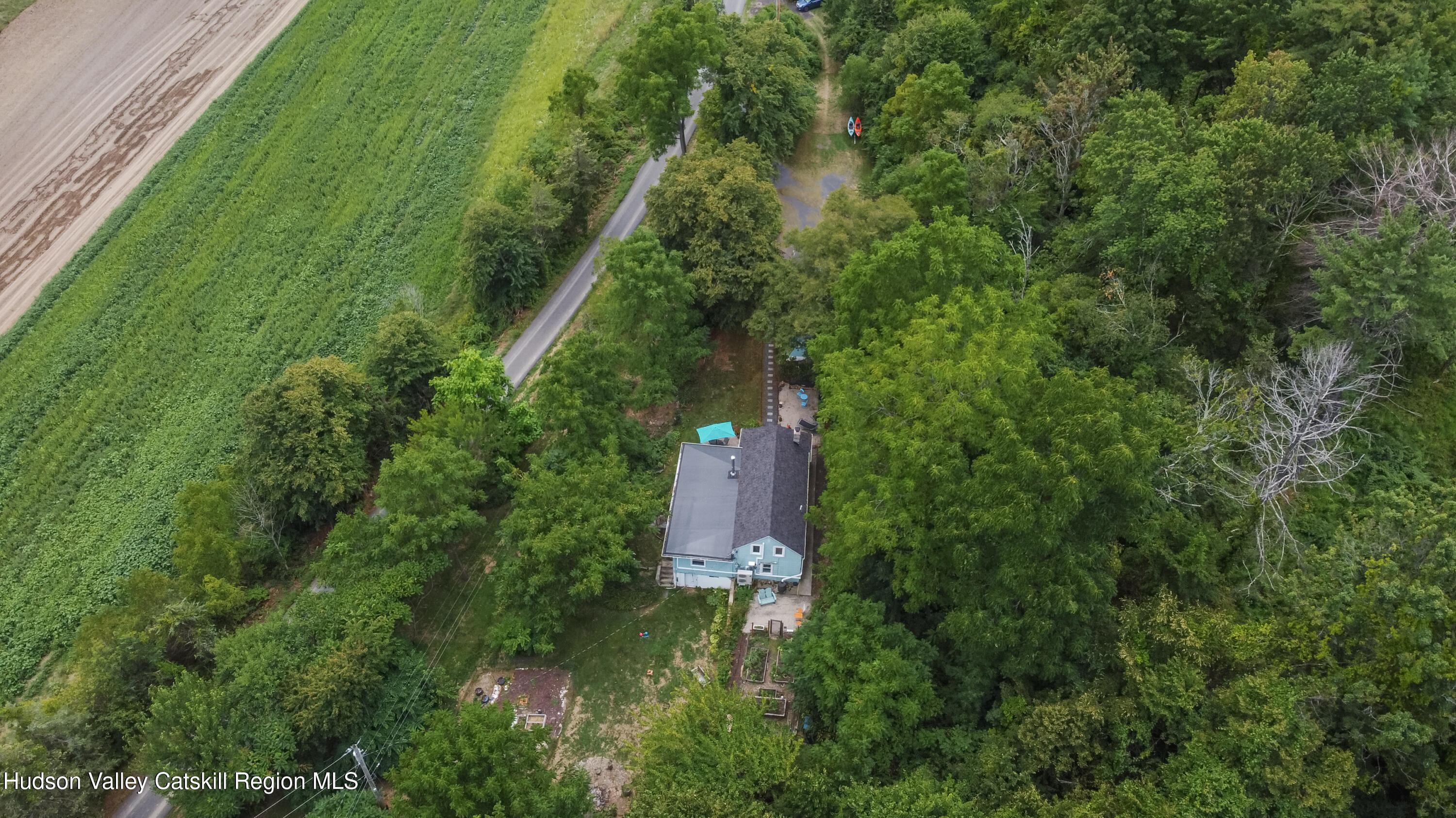 99 Spoorenburgh Road Athens, NY 12015 - Photo 38 of 39 an aerial view of residential house with outdoor space and trees all around