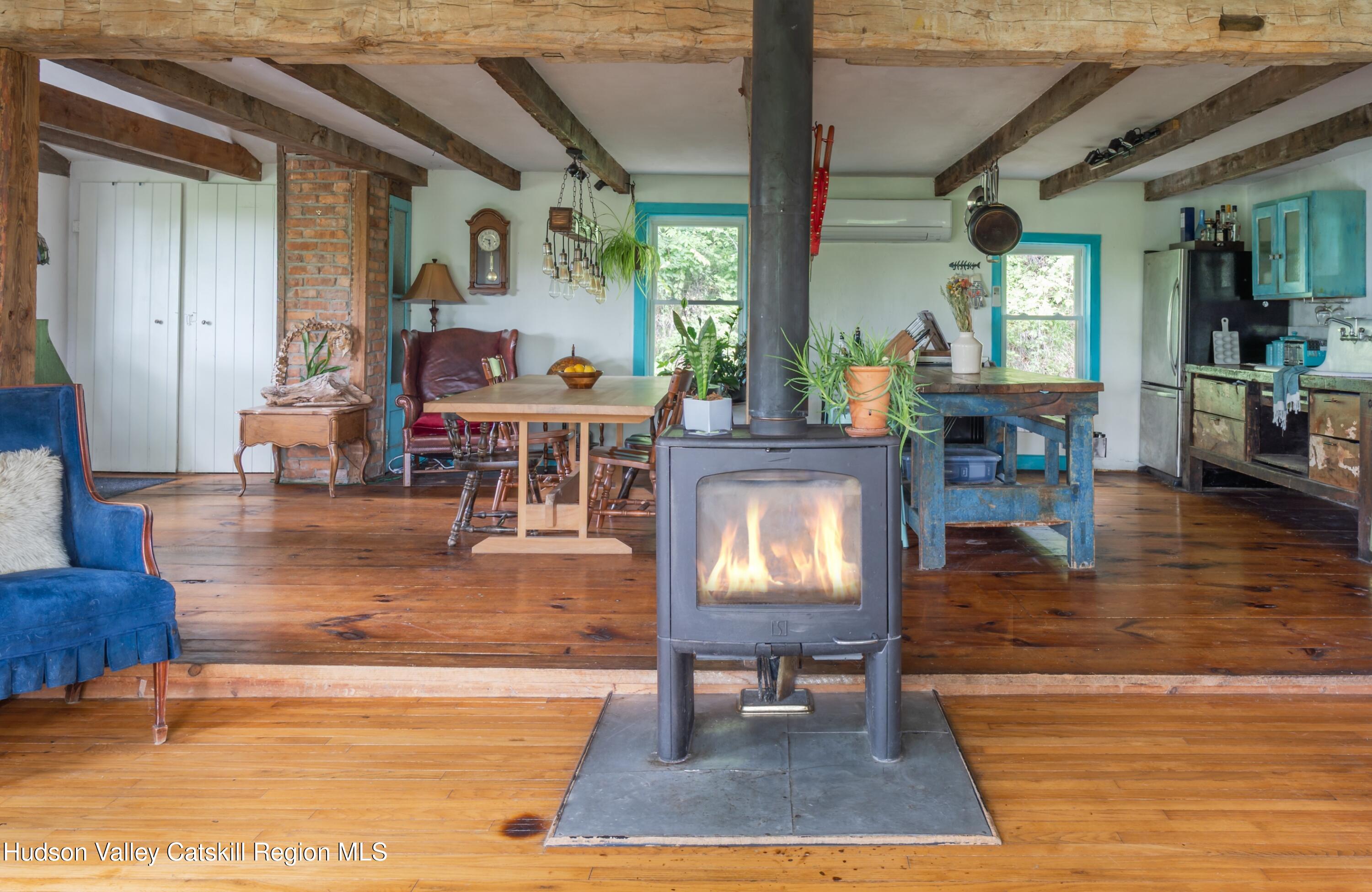 99 Spoorenburgh Road Athens, NY 12015 - Photo 6 of 39 a living room with furniture and a table