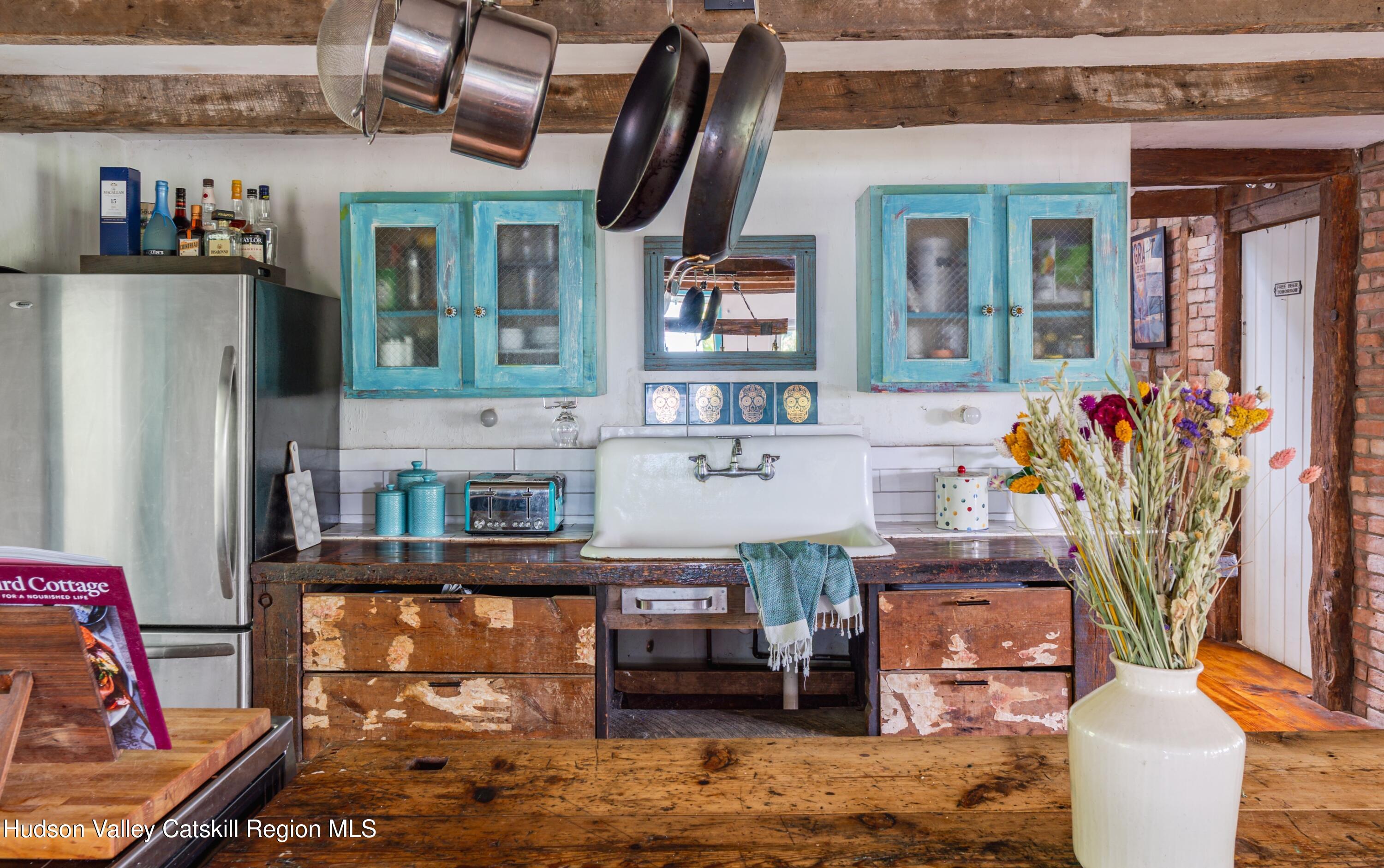 99 Spoorenburgh Road Athens, NY 12015 - Photo 9 of 39 a living room with fireplace furniture and a window