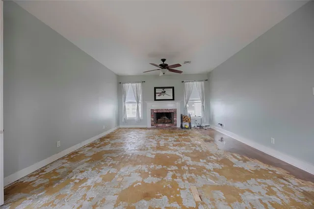a bathroom with a toilet a sink and a mirror
