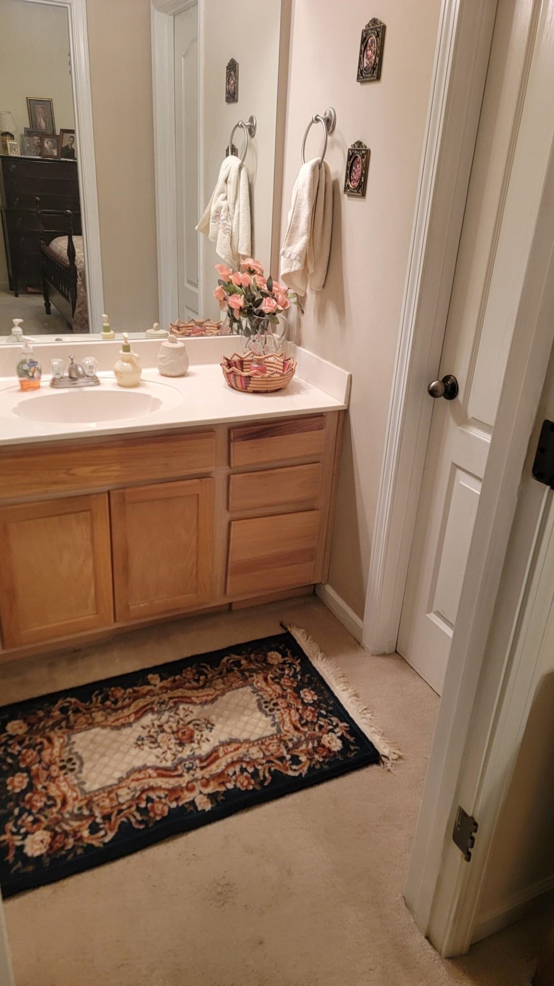 1017 Milano Cove Memphis, TN 38018 - Photo 19 of 20 a bathroom with a sink and a mirror