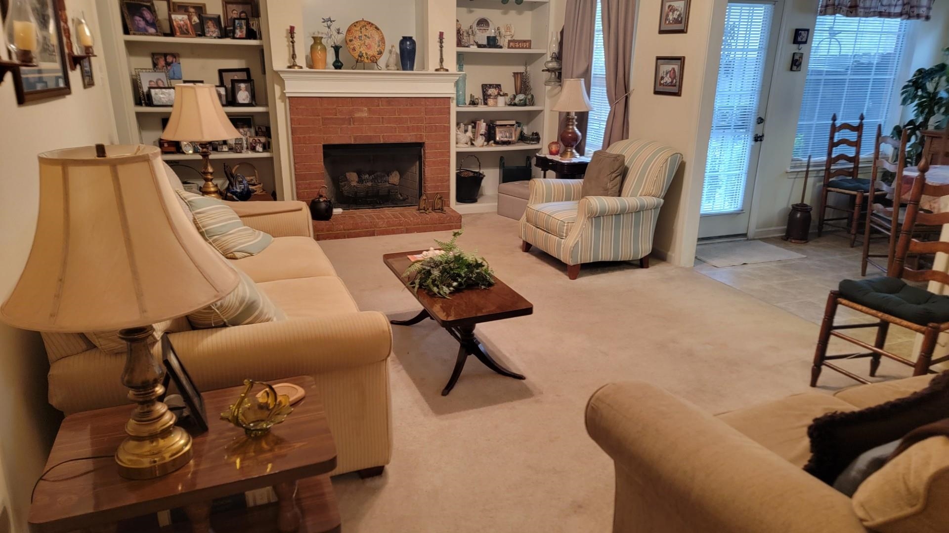 1017 Milano Cove Memphis, TN 38018 - Photo 6 of 20 a living room with furniture and a fireplace