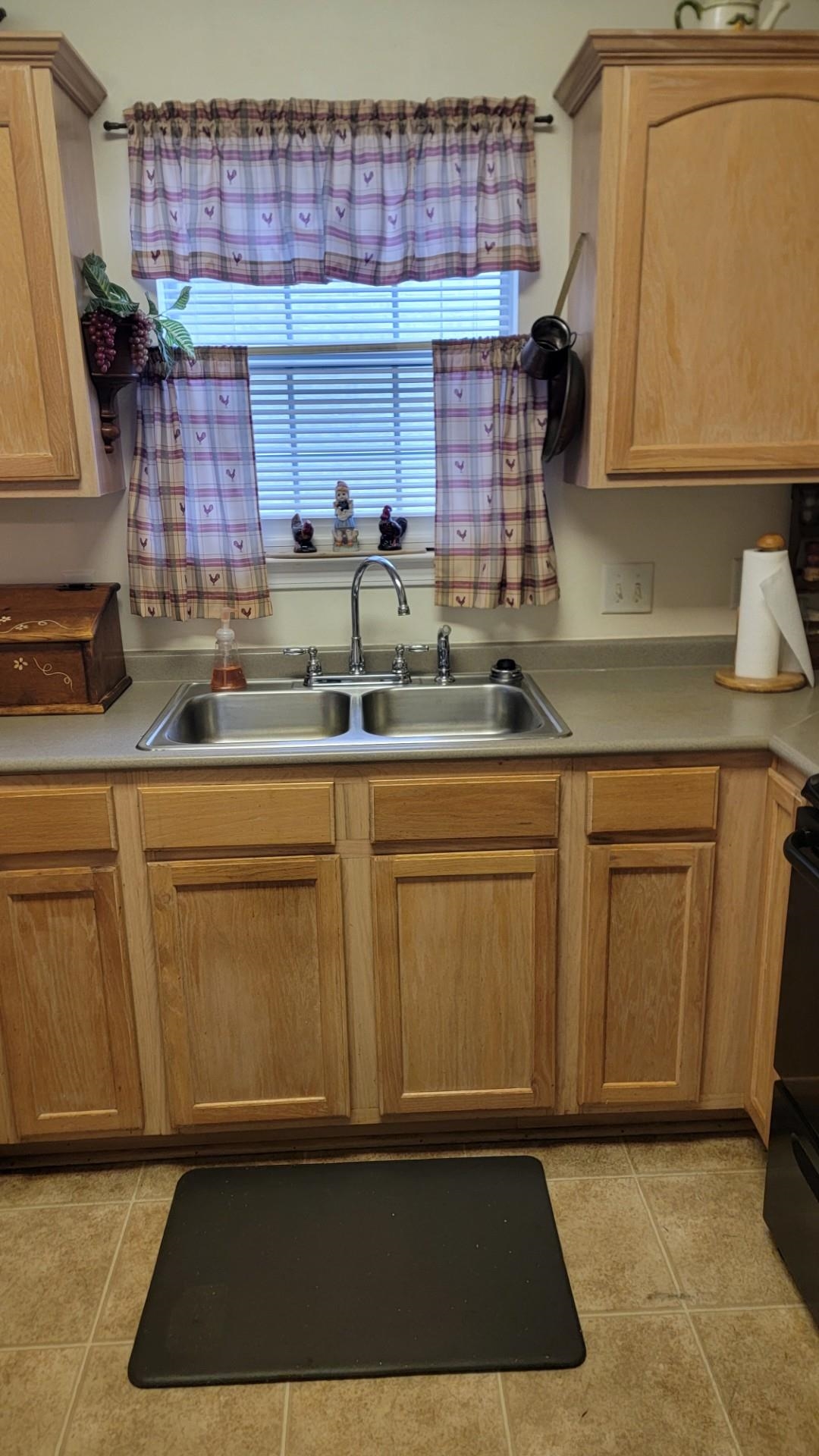 1017 Milano Cove Memphis, TN 38018 - Photo 8 of 20 a kitchen with stainless steel appliances granite countertop a sink stove and cabinets