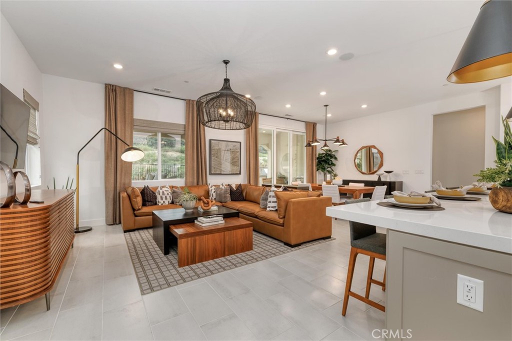 a very nice looking living room with a large window