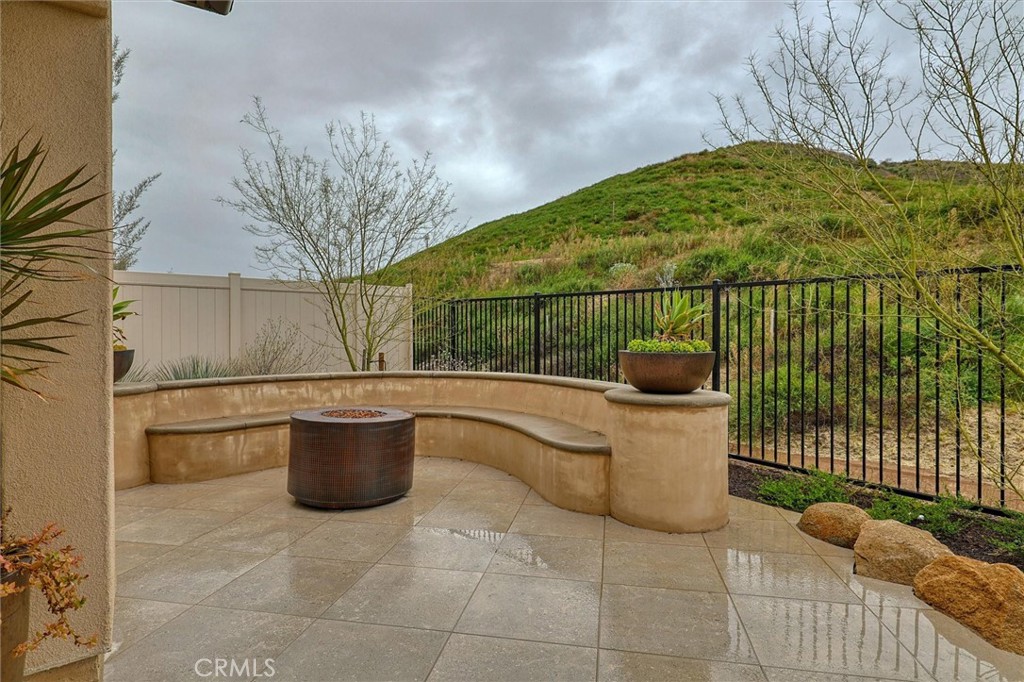 29606 Paseo Capilla Valencia, CA 91354 - Photo 22 of 26 a view of a patio with iron fence