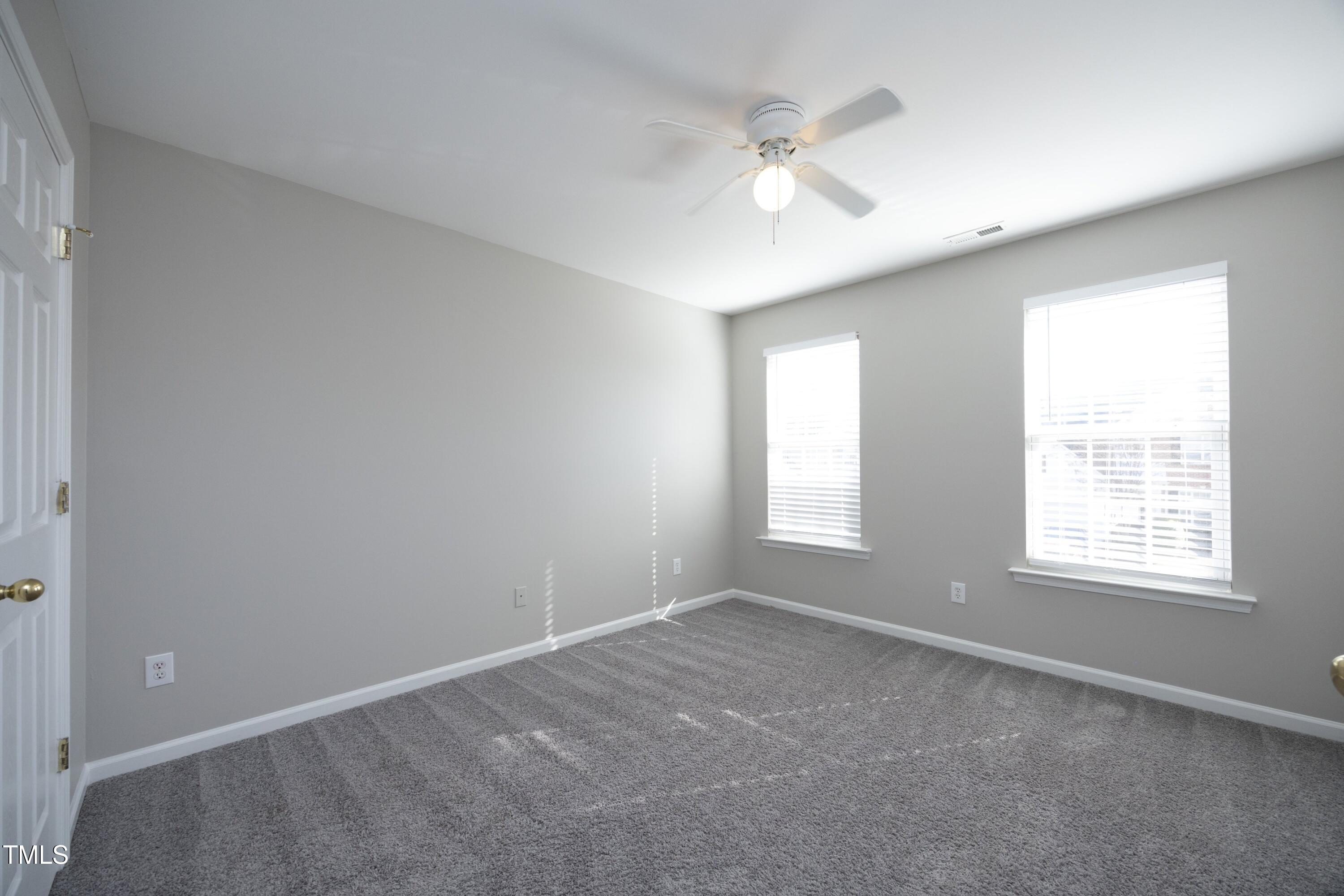 1525 Nealstone Way Raleigh, NC 27614 - Photo 29 of 47 a view of an empty room with a window