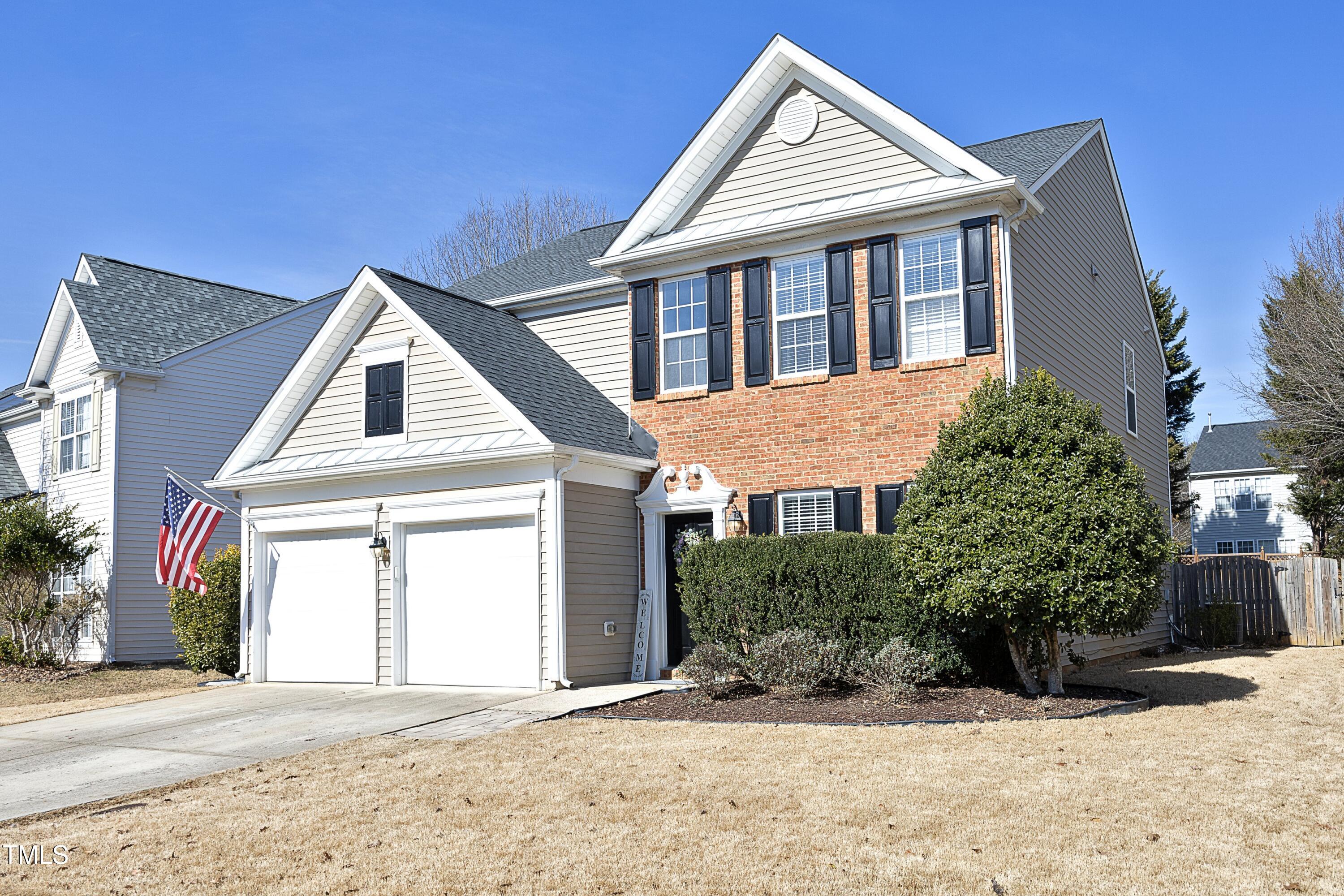 1525 Nealstone Way Raleigh, NC 27614 - Photo 2 of 47 a view of a house with a yard
