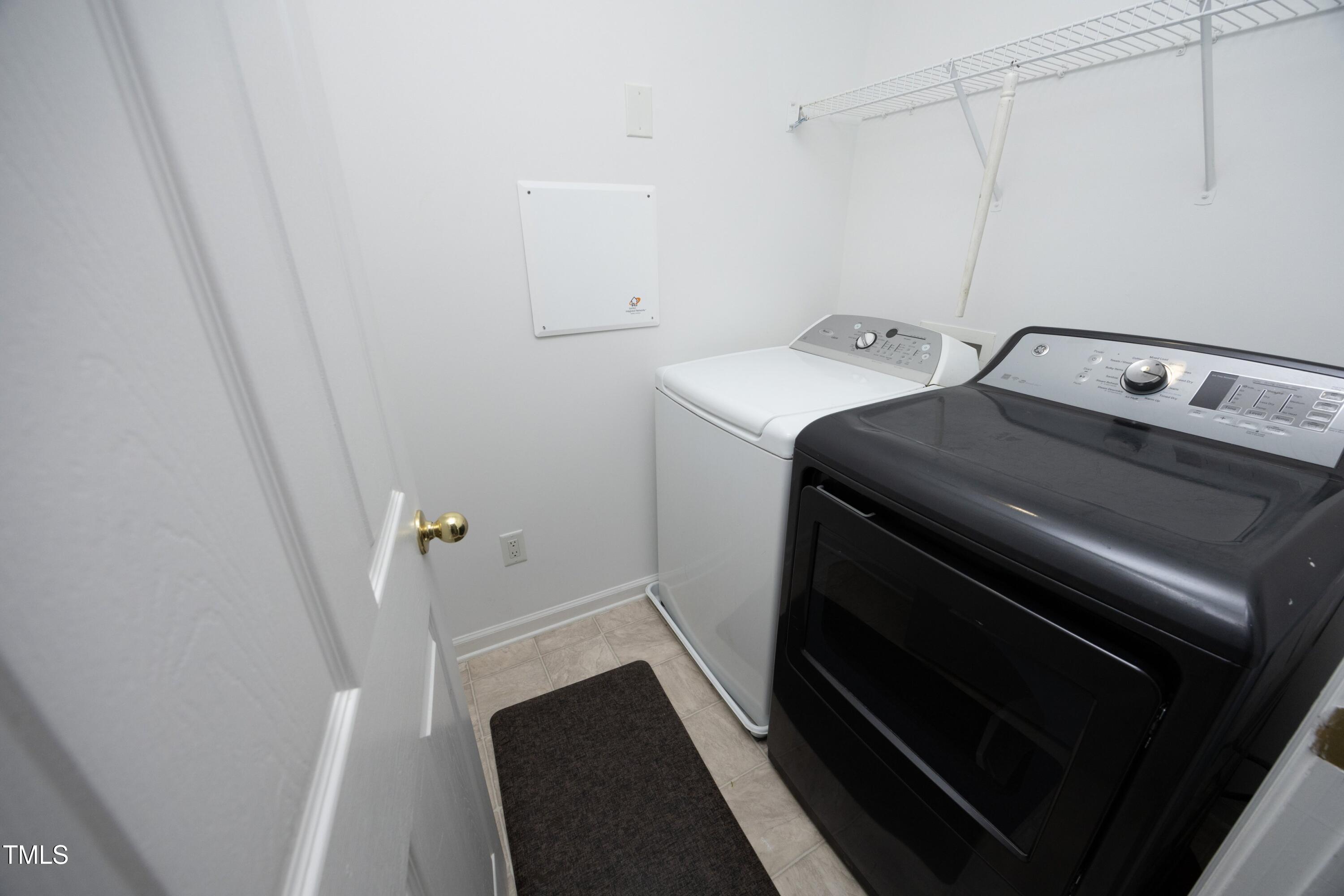 1525 Nealstone Way Raleigh, NC 27614 - Photo 37 of 47 a utility room with dryer and washer