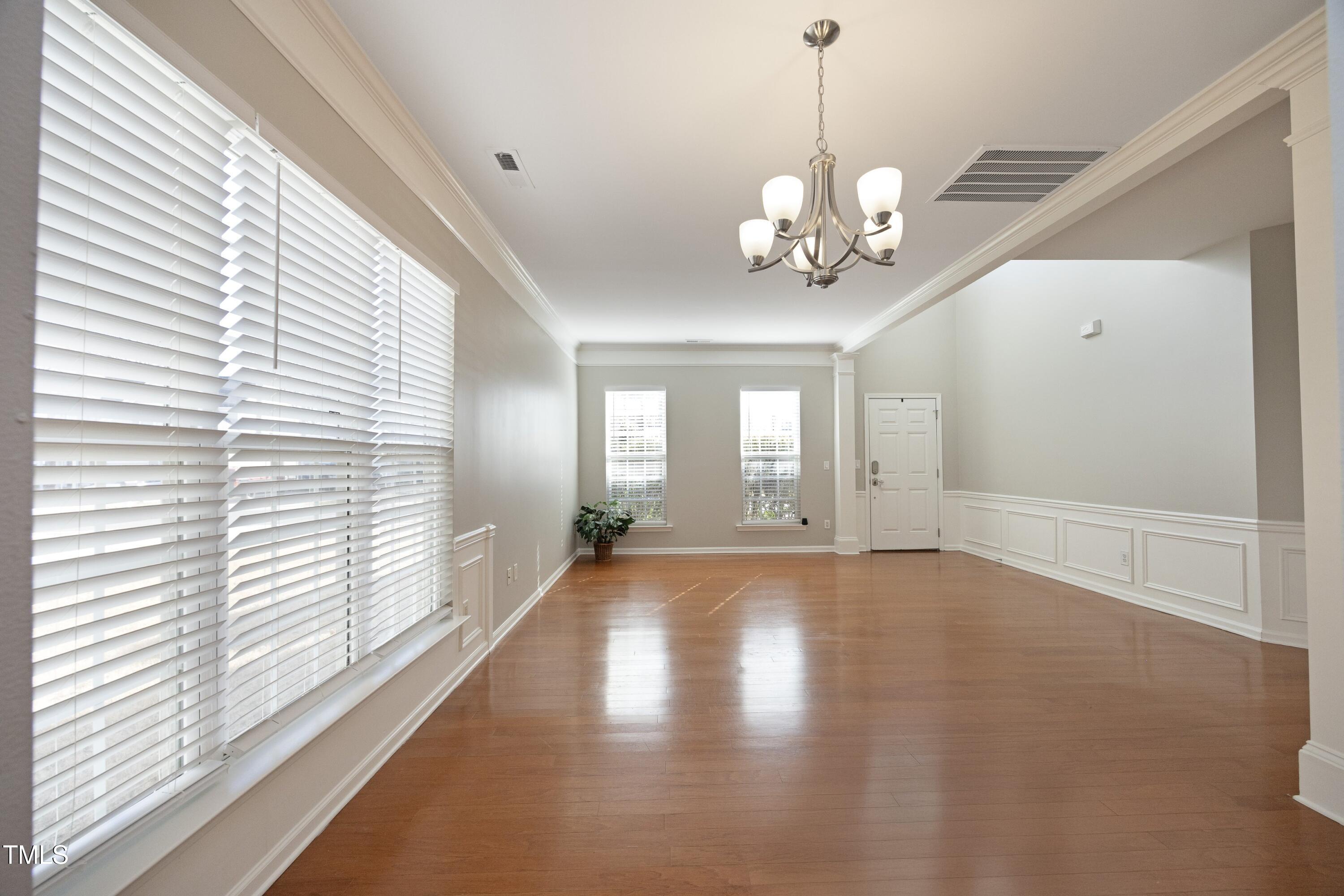 1525 Nealstone Way Raleigh, NC 27614 - Photo 7 of 47 a view of an empty room with a window
