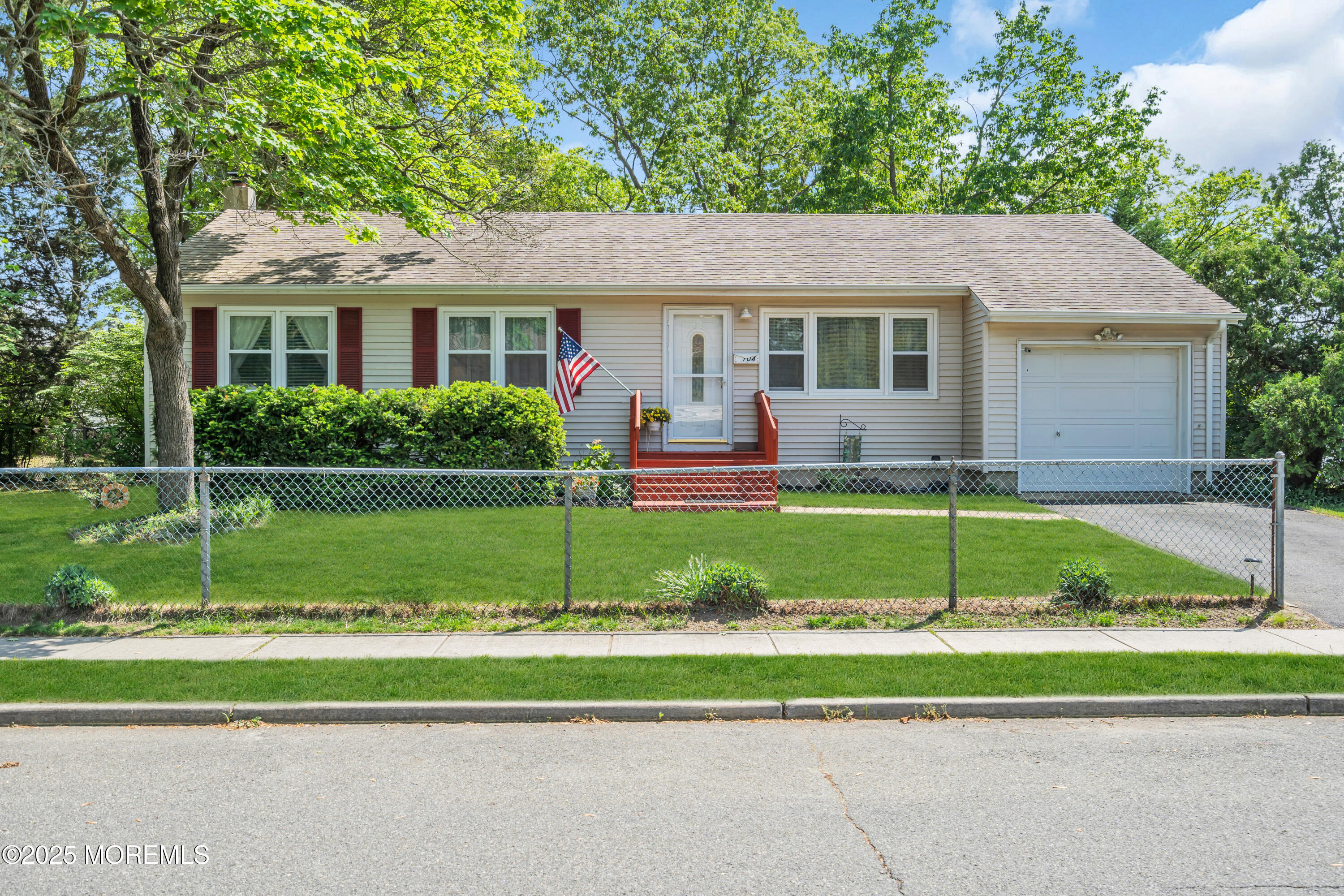 104 Frede Drive Brick, NJ 08724 - Photo 2 of 62 a view of house with a big yard and palm trees