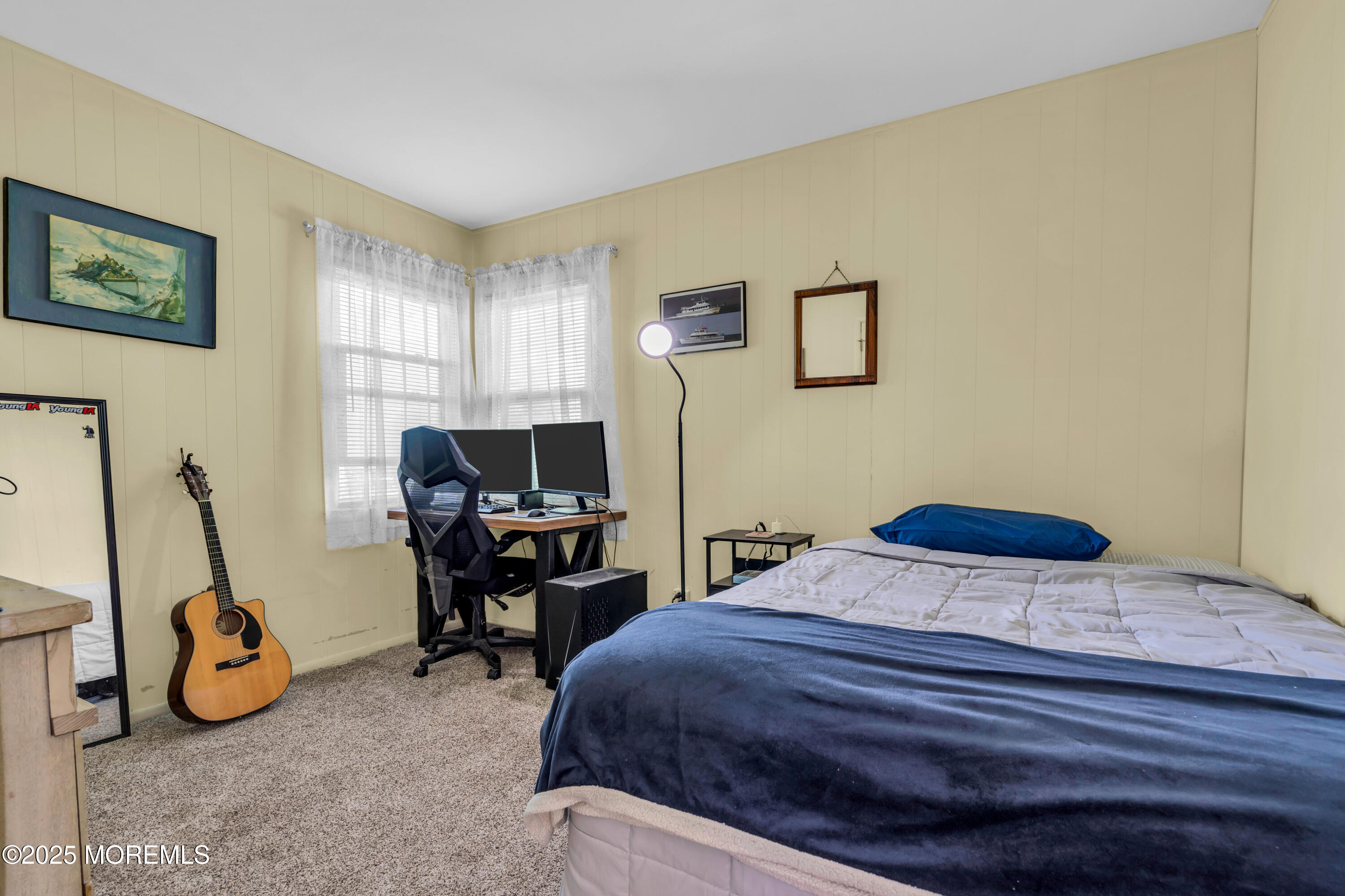 104 Frede Drive Brick, NJ 08724 - Photo 25 of 62 a bedroom that has a bed and a chair