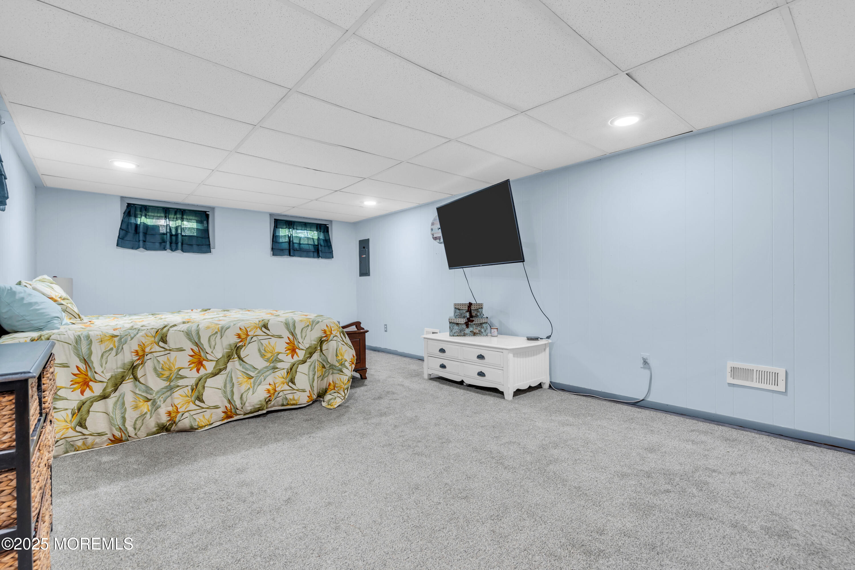 104 Frede Drive Brick, NJ 08724 - Photo 26 of 62 a bed room with furniture and a flat screen tv