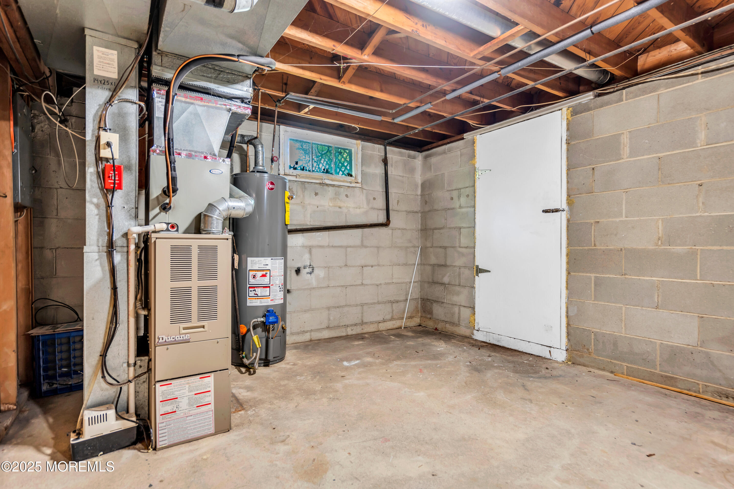 104 Frede Drive Brick, NJ 08724 - Photo 29 of 62 a view of storage and utility room
