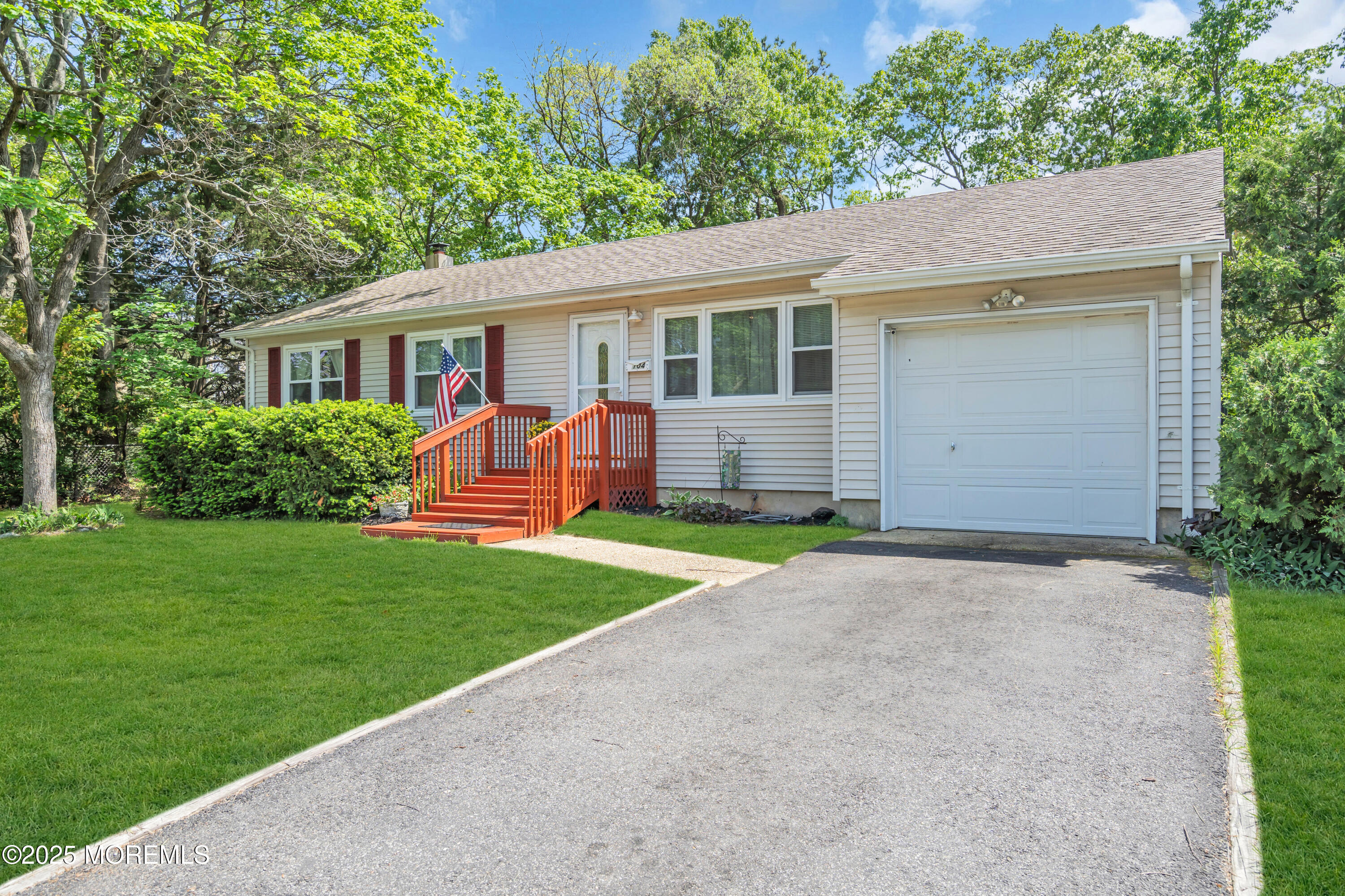 104 Frede Drive Brick, NJ 08724 - Photo 3 of 62 a front view of house with yard and green space