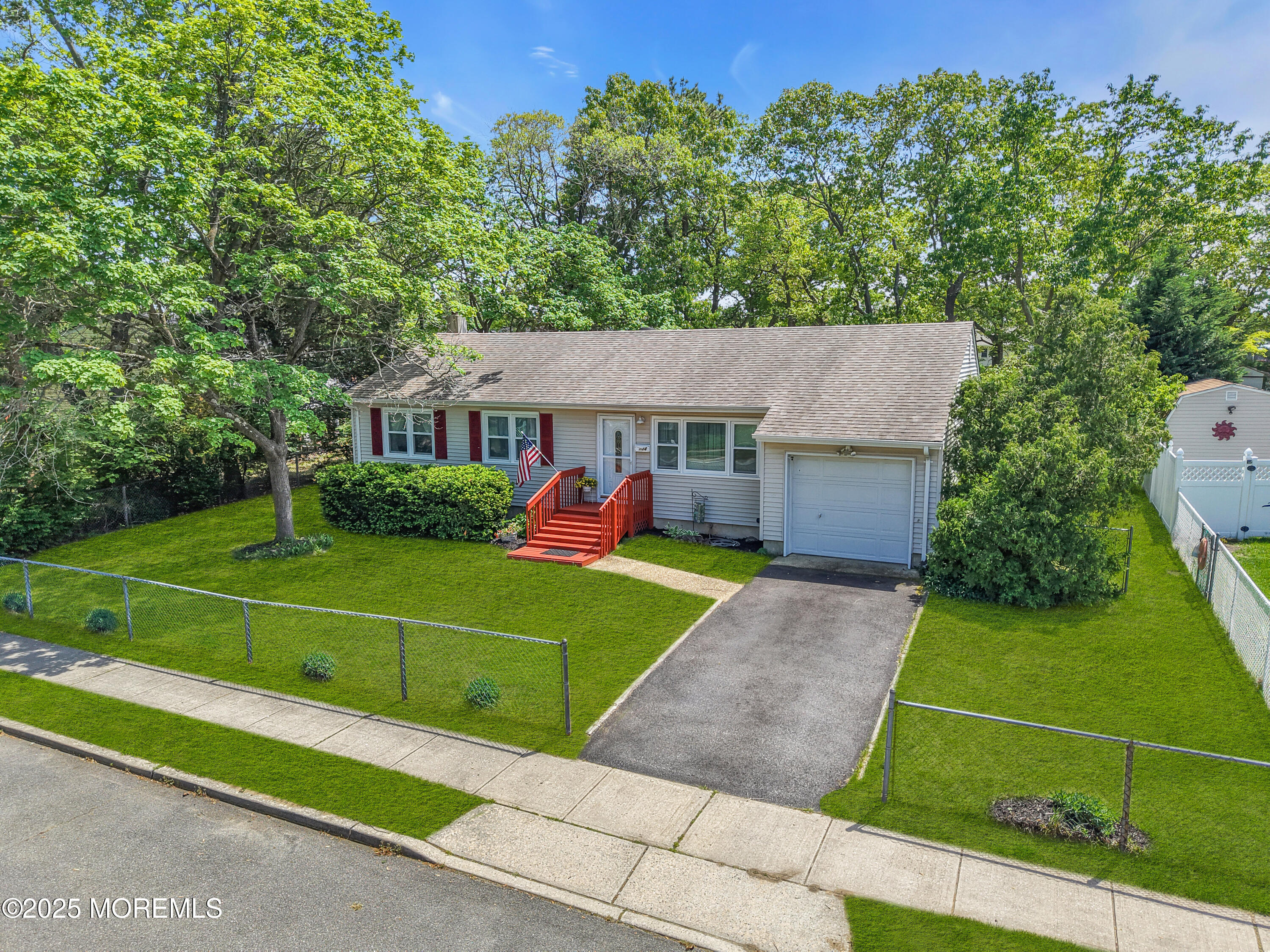 104 Frede Drive Brick, NJ 08724 - Photo 37 of 62 a view of a house with a yard