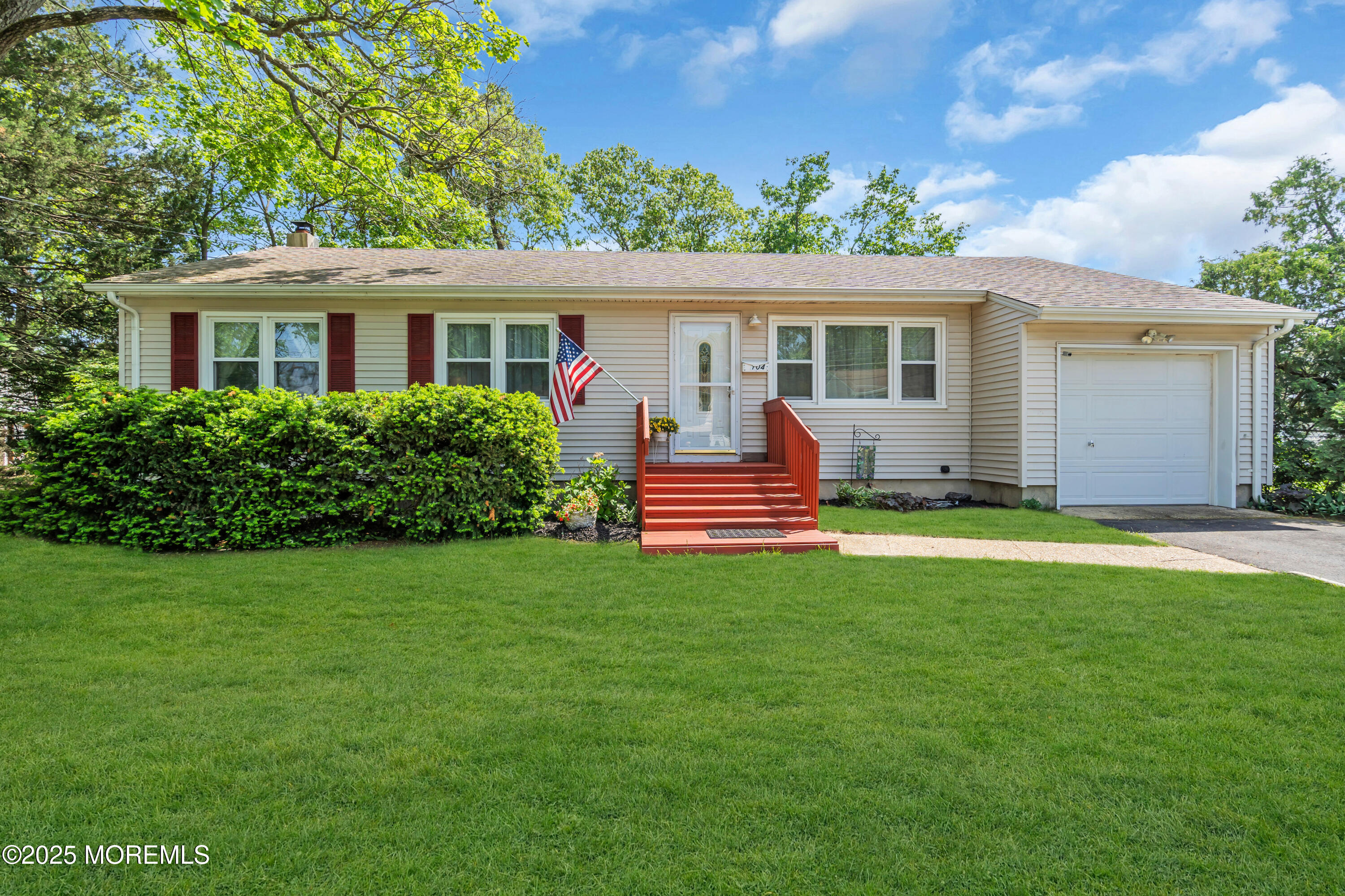 104 Frede Drive Brick, NJ 08724 - Photo 4 of 62 a front view of house with yard and green space