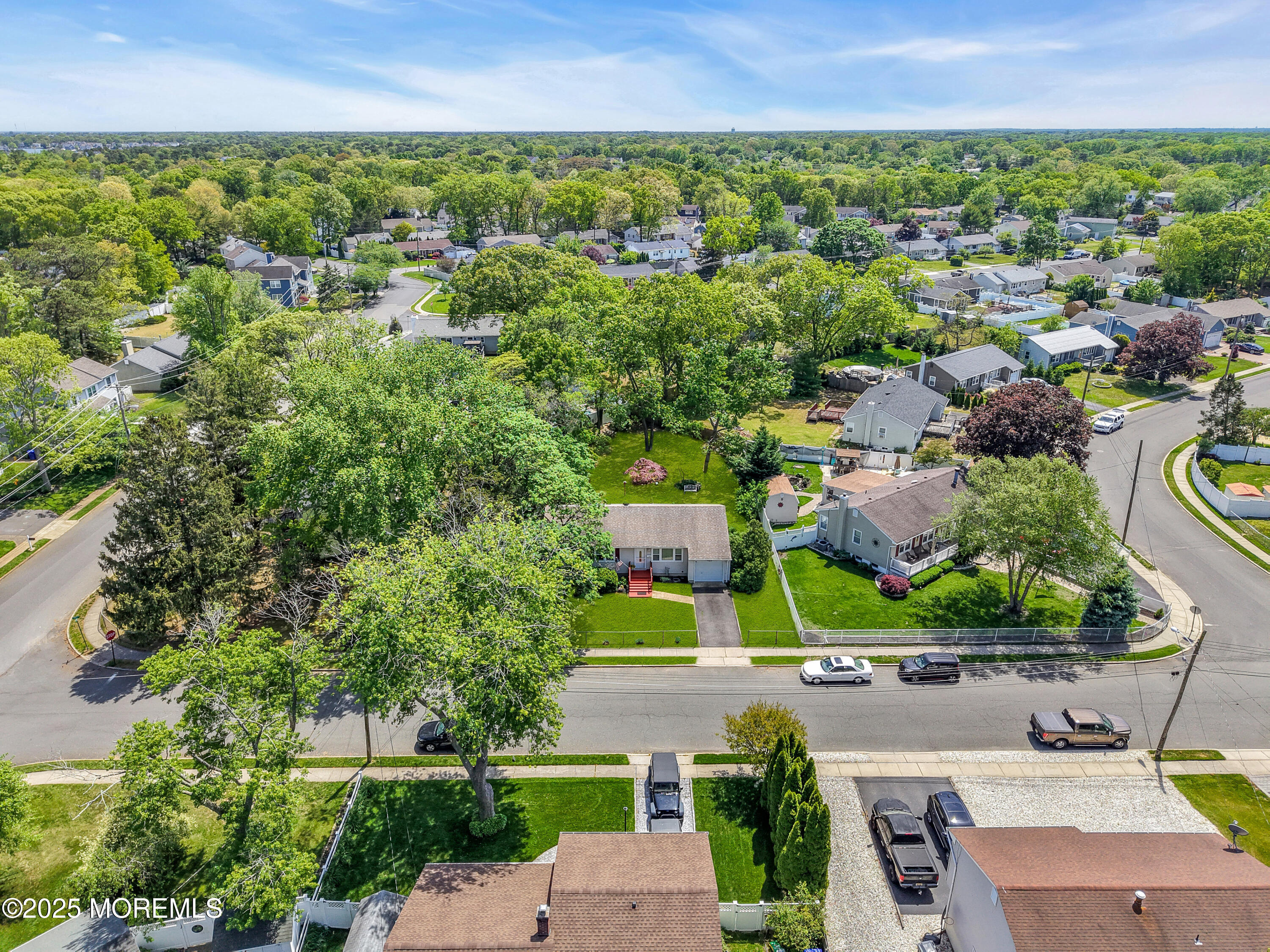 104 Frede Drive Brick, NJ 08724 - Photo 42 of 62 an aerial view of a house with a garden