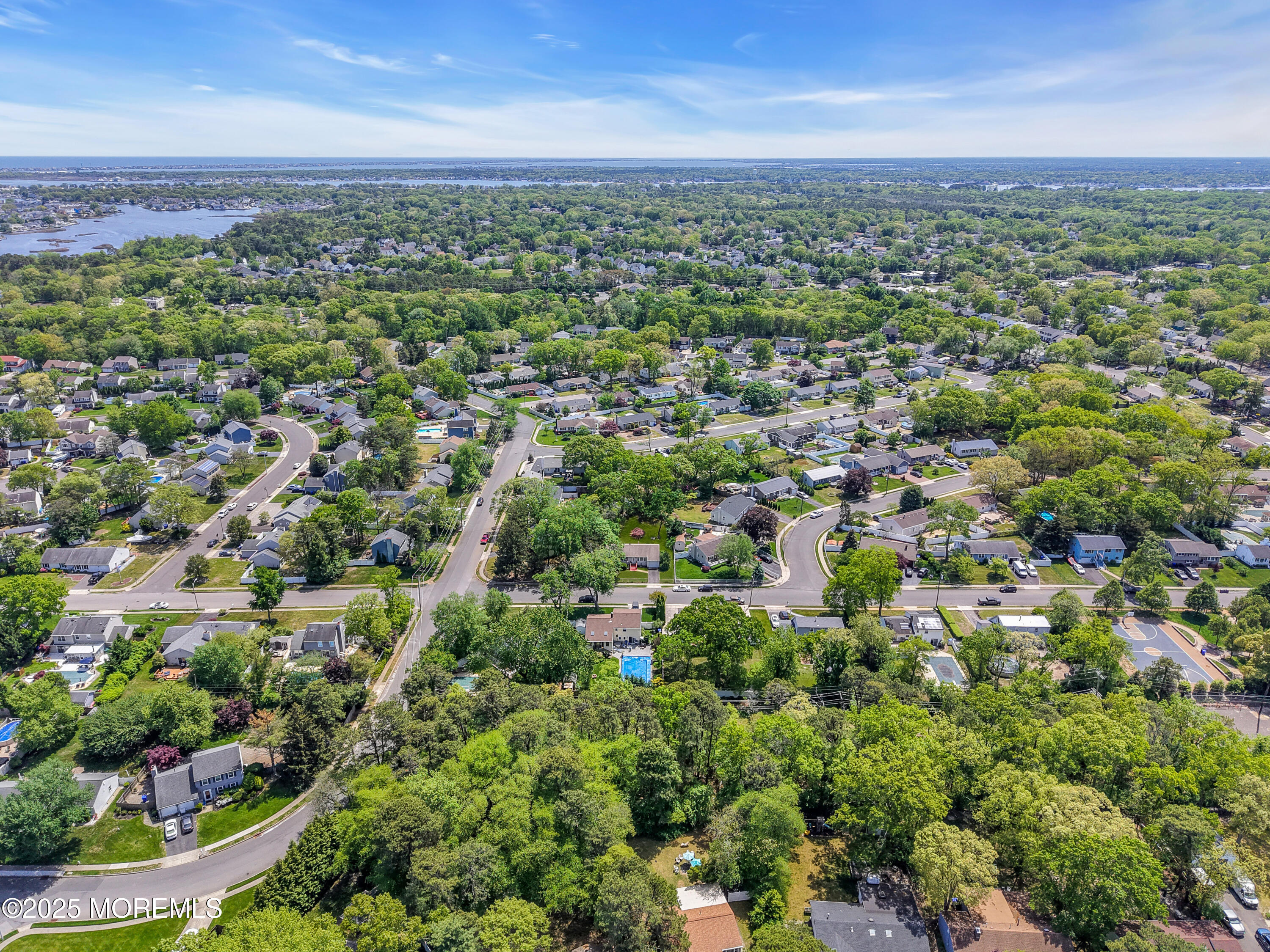 104 Frede Drive Brick, NJ 08724 - Photo 48 of 62 an aerial view of a city with lots of residential buildings