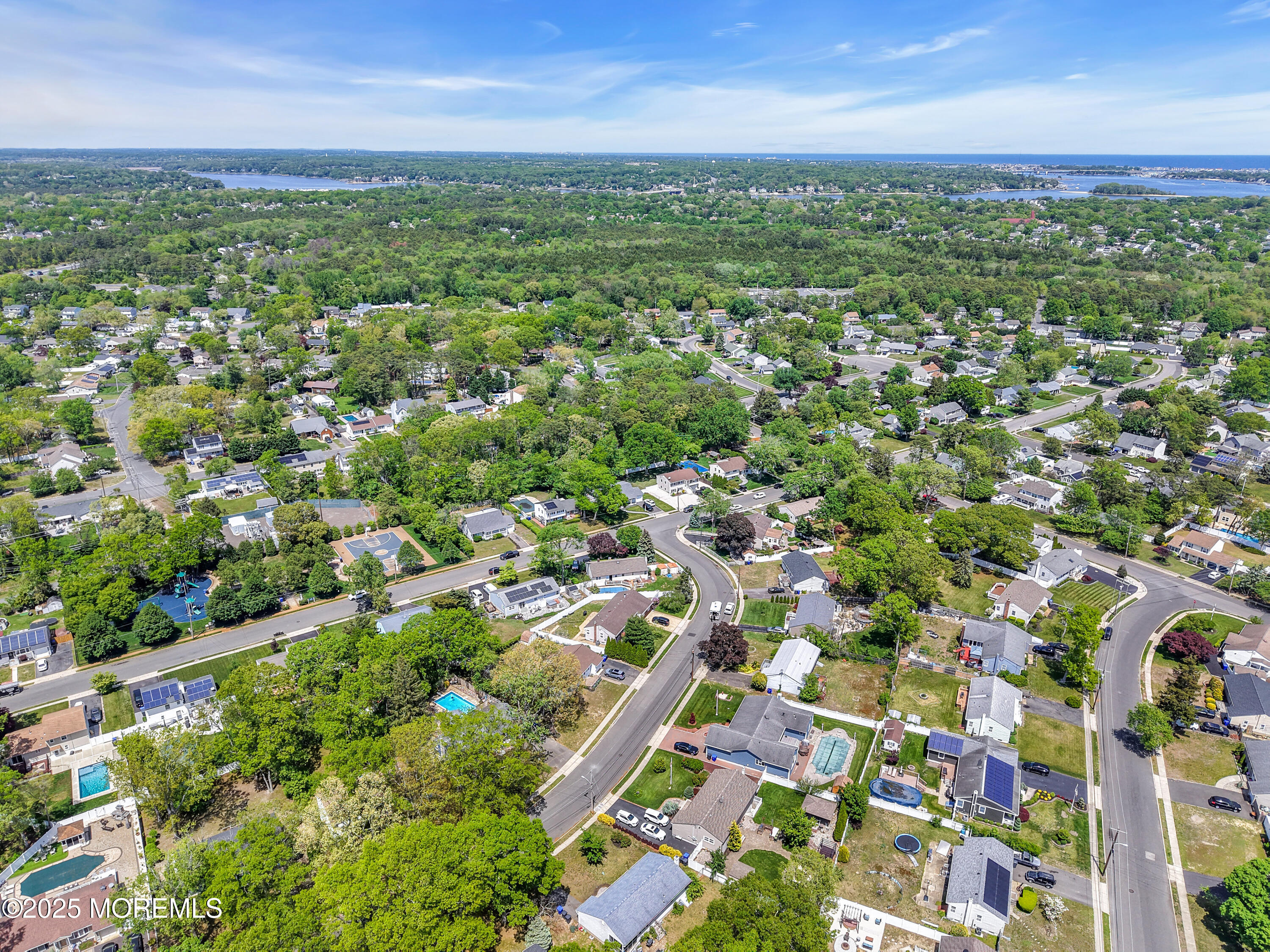 104 Frede Drive Brick, NJ 08724 - Photo 53 of 62 an aerial view of residential houses with outdoor space and trees
