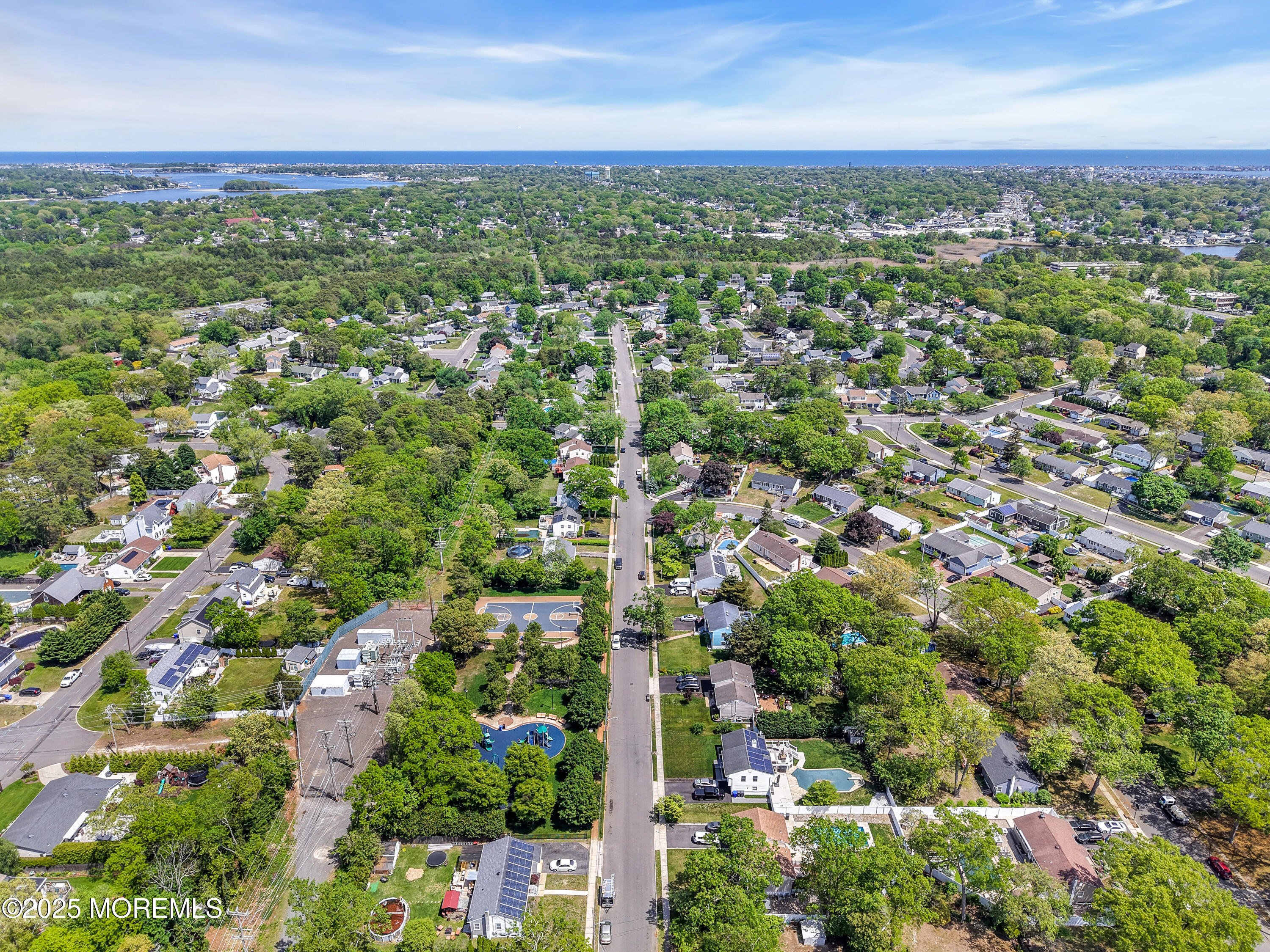 104 Frede Drive Brick, NJ 08724 - Photo 54 of 62 an aerial view of residential houses with outdoor space and trees