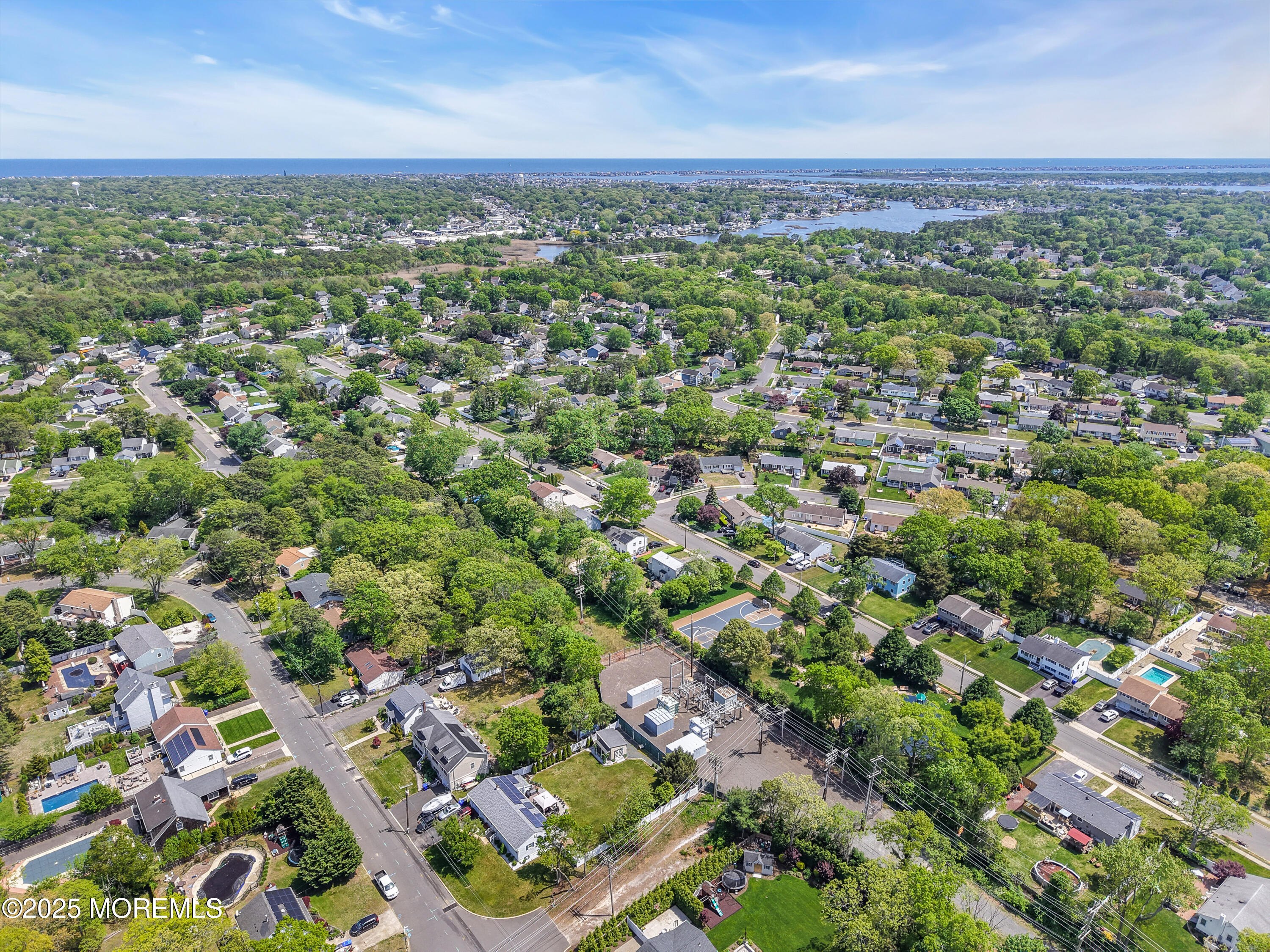 104 Frede Drive Brick, NJ 08724 - Photo 55 of 62 an aerial view of residential houses with outdoor space and trees