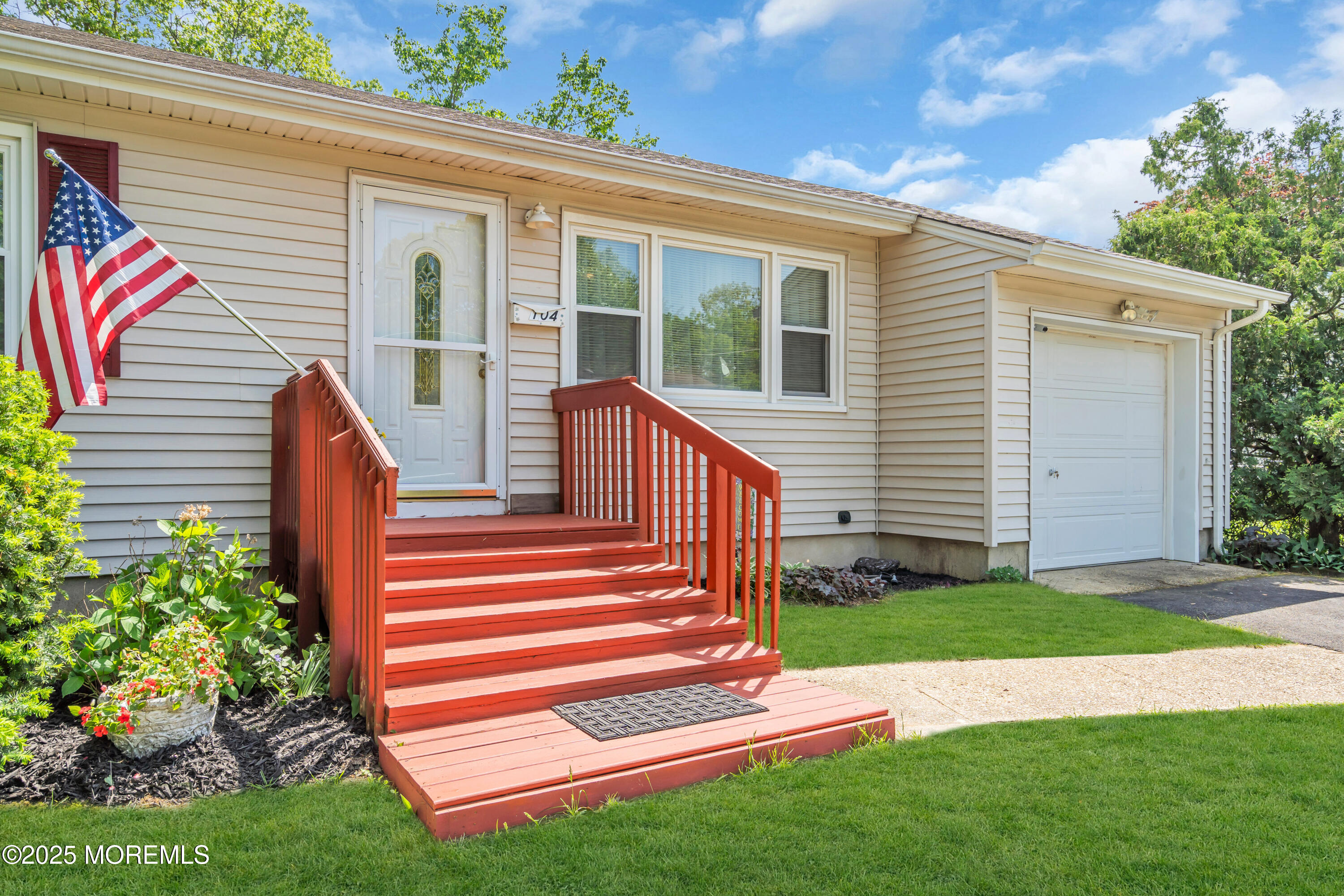 104 Frede Drive Brick, NJ 08724 - Photo 6 of 62 a view of a house with a yard and a garden