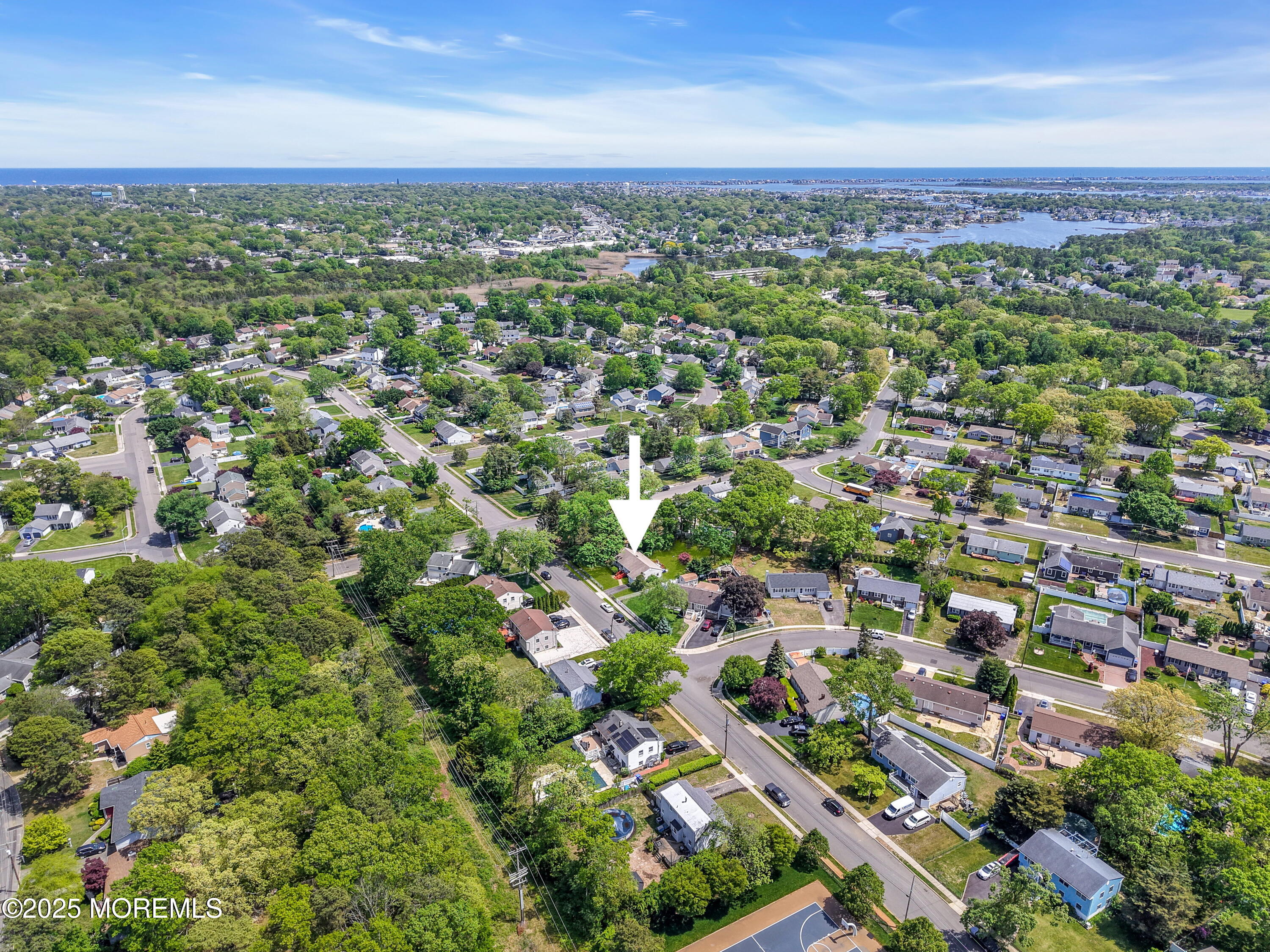 104 Frede Drive Brick, NJ 08724 - Photo 61 of 62 an aerial view of residential houses with outdoor space and trees