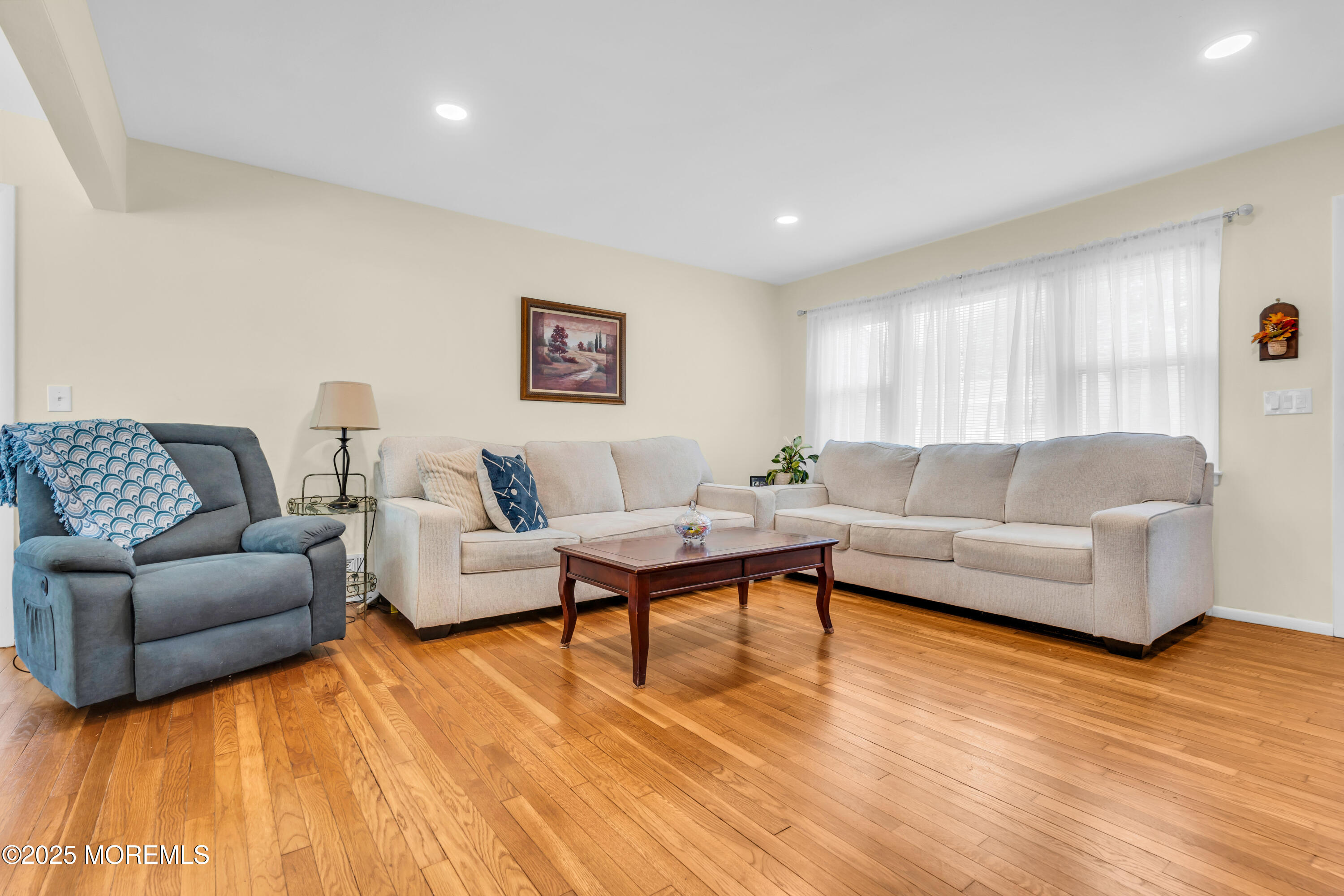 104 Frede Drive Brick, NJ 08724 - Photo 9 of 62 a living room with furniture and a wooden floor