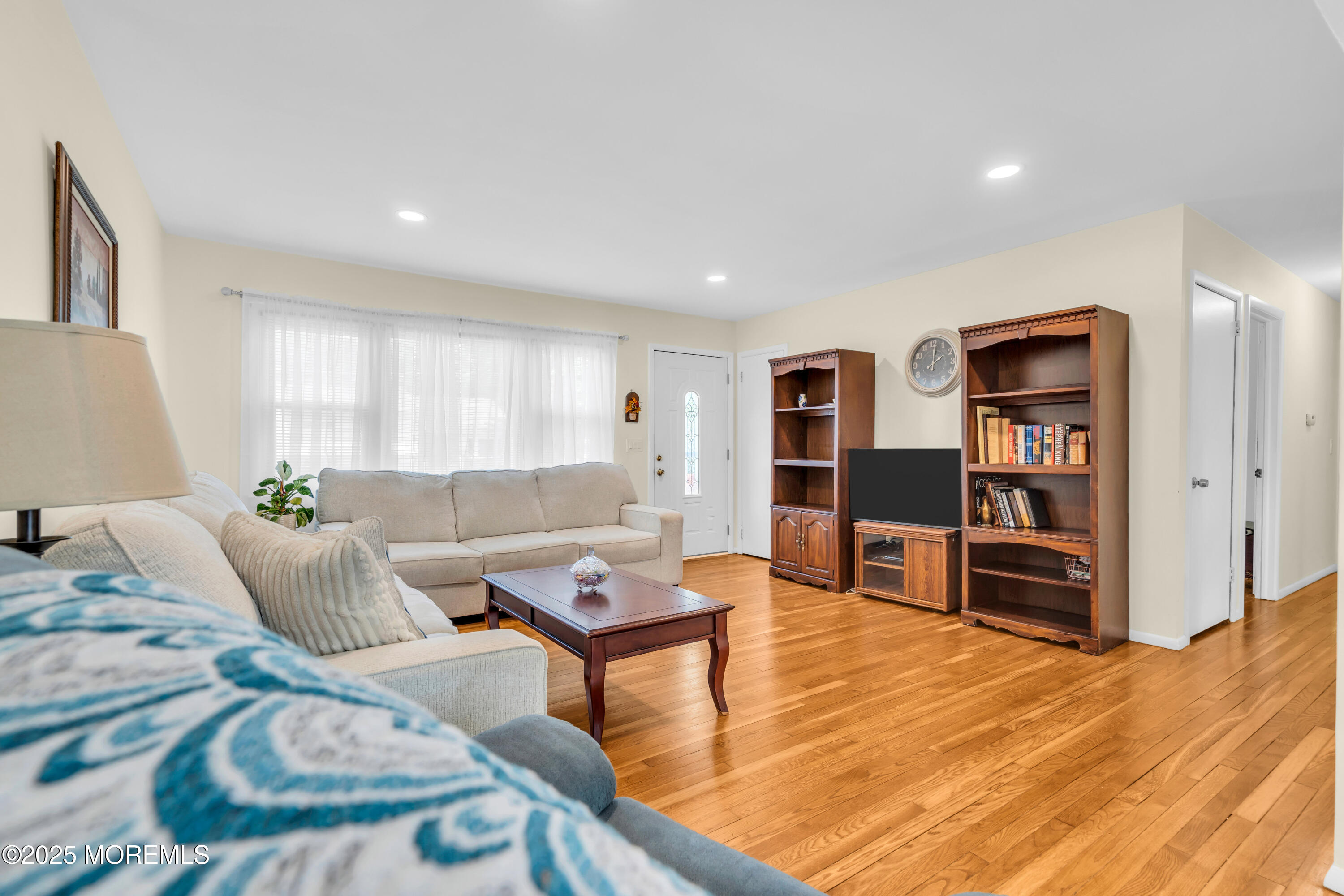 104 Frede Drive Brick, NJ 08724 - Photo 10 of 62 a living room with furniture and a flat screen tv