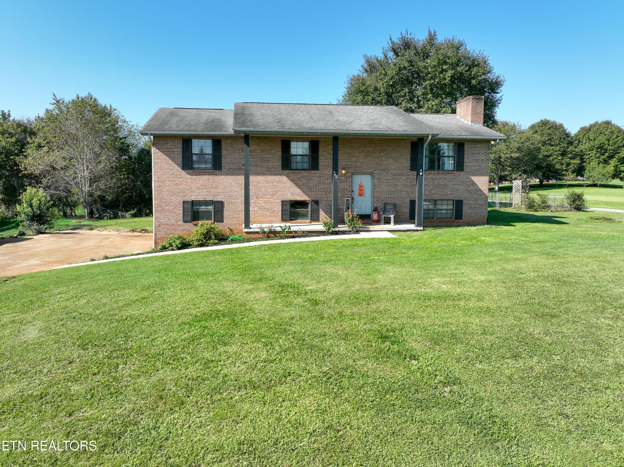 445 Foss Road Maryville, TN 37801 - Photo 2 of 40 a front view of a house with a yard