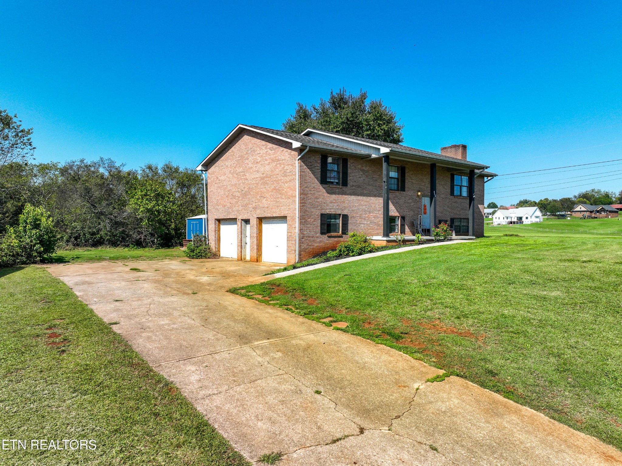 445 Foss Road Maryville, TN 37801 - Photo 5 of 40 a view of a house with a yard