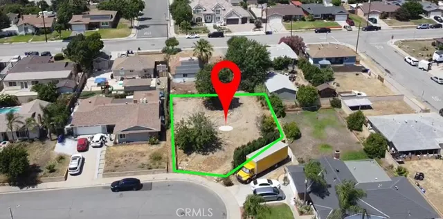 an aerial view of multiple houses with outdoor space
