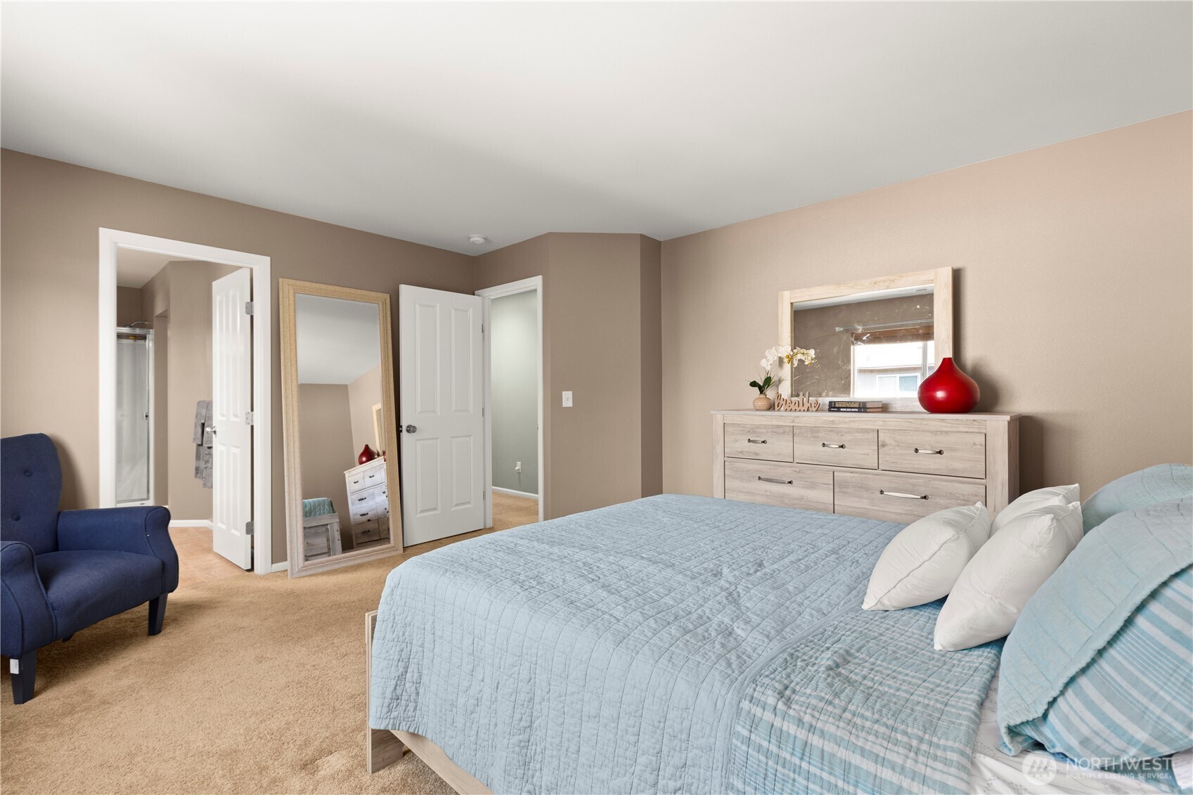 24002 Southeast 262nd Street Maple Valley, WA 98038 - Photo 16 of 30 a spacious bedroom with a bed and furniture