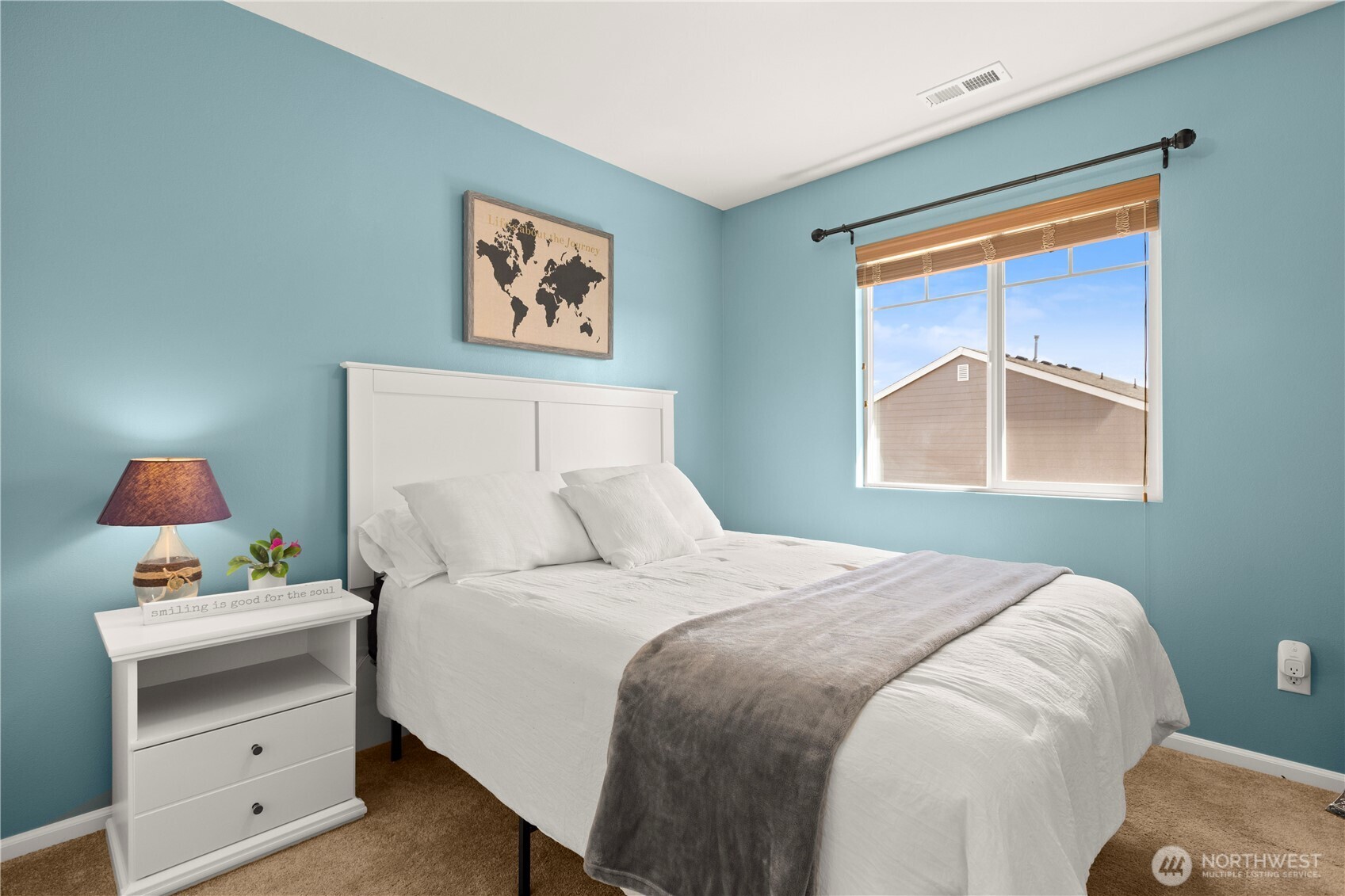 24002 Southeast 262nd Street Maple Valley, WA 98038 - Photo 19 of 30 a bedroom with a bed and a window