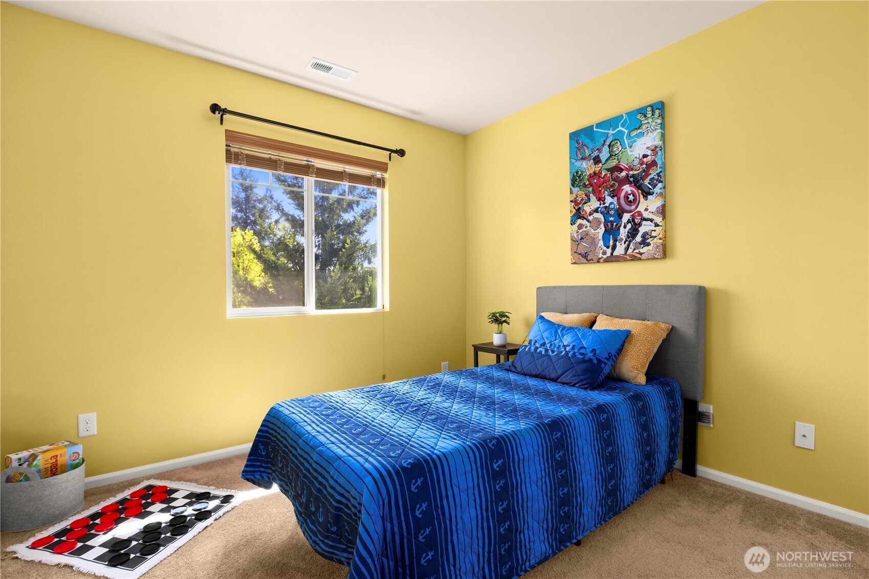 24002 Southeast 262nd Street Maple Valley, WA 98038 - Photo 21 of 30 a bedroom with a bed and a painting on the wall