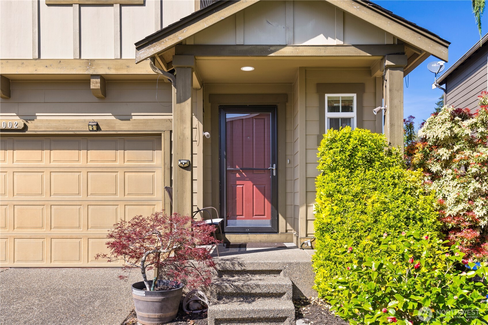 24002 Southeast 262nd Street Maple Valley, WA 98038 - Photo 3 of 30 a front view of a house