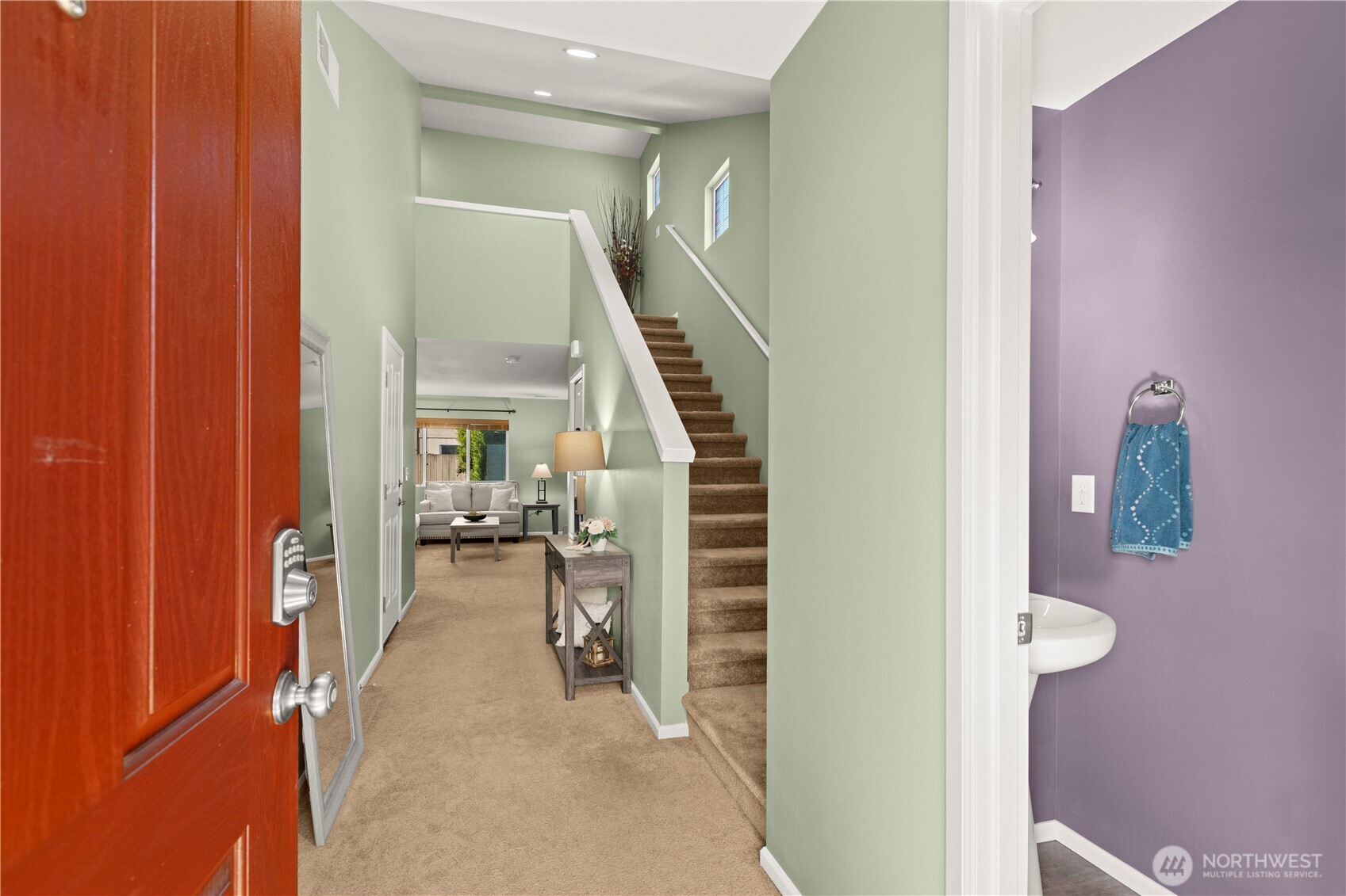 24002 Southeast 262nd Street Maple Valley, WA 98038 - Photo 4 of 30 a view of entryway and hall with wooden floor