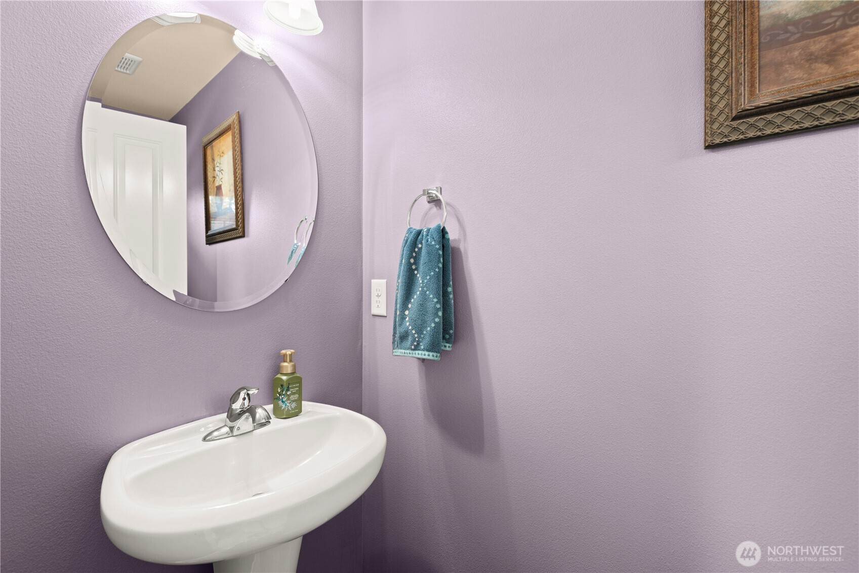 24002 Southeast 262nd Street Maple Valley, WA 98038 - Photo 5 of 30 a bathroom with a sink and mirror