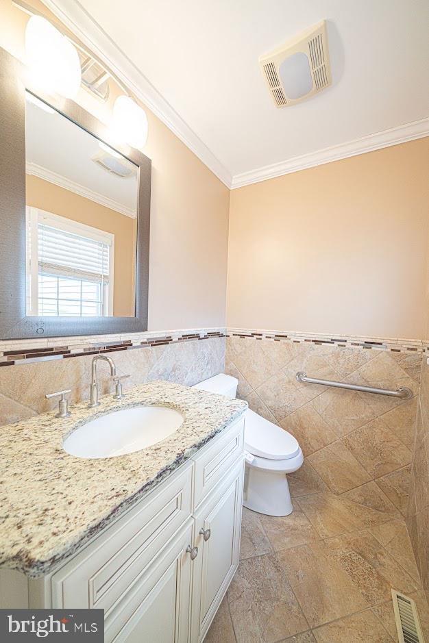 642 Pugh Road Wayne, PA 19087 - Photo 19 of 65 a bathroom with a granite countertop sink and a mirror
