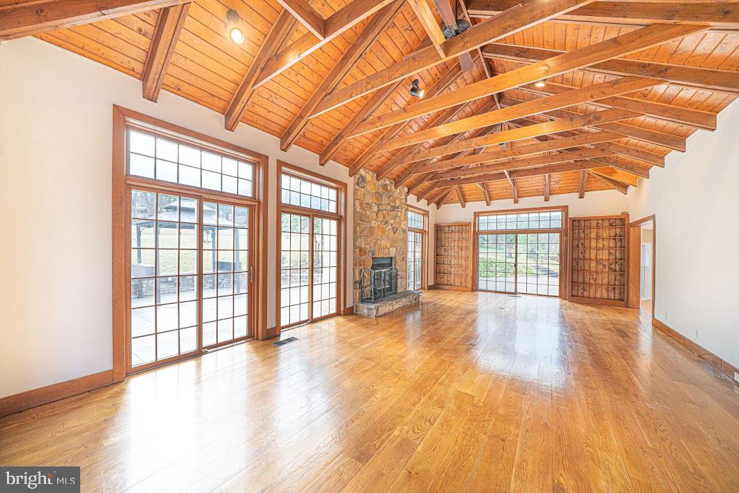 642 Pugh Road Wayne, PA 19087 - Photo 22 of 65 a view of empty room with wooden floor and fan
